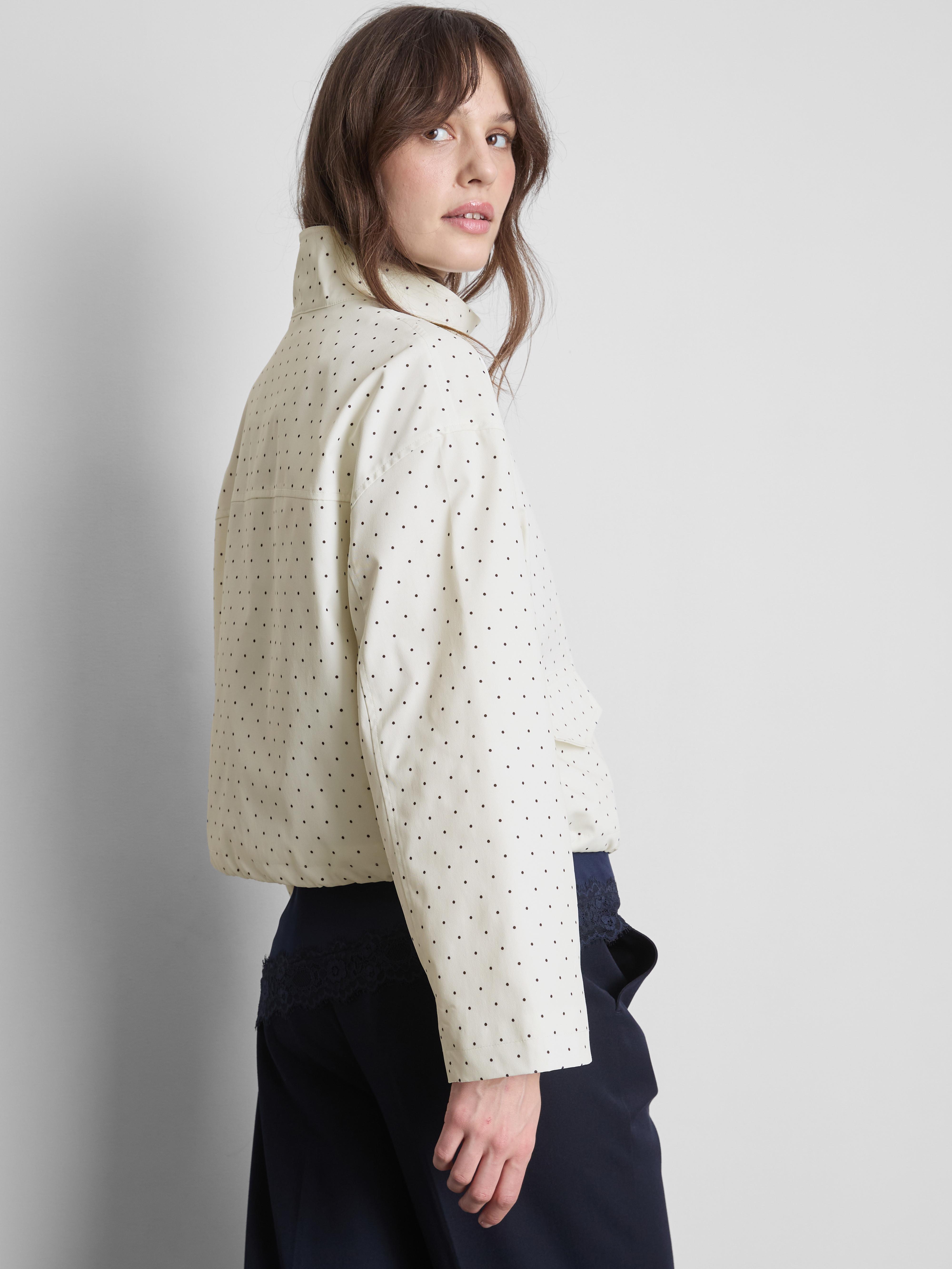 Veste à pois et col cheminée