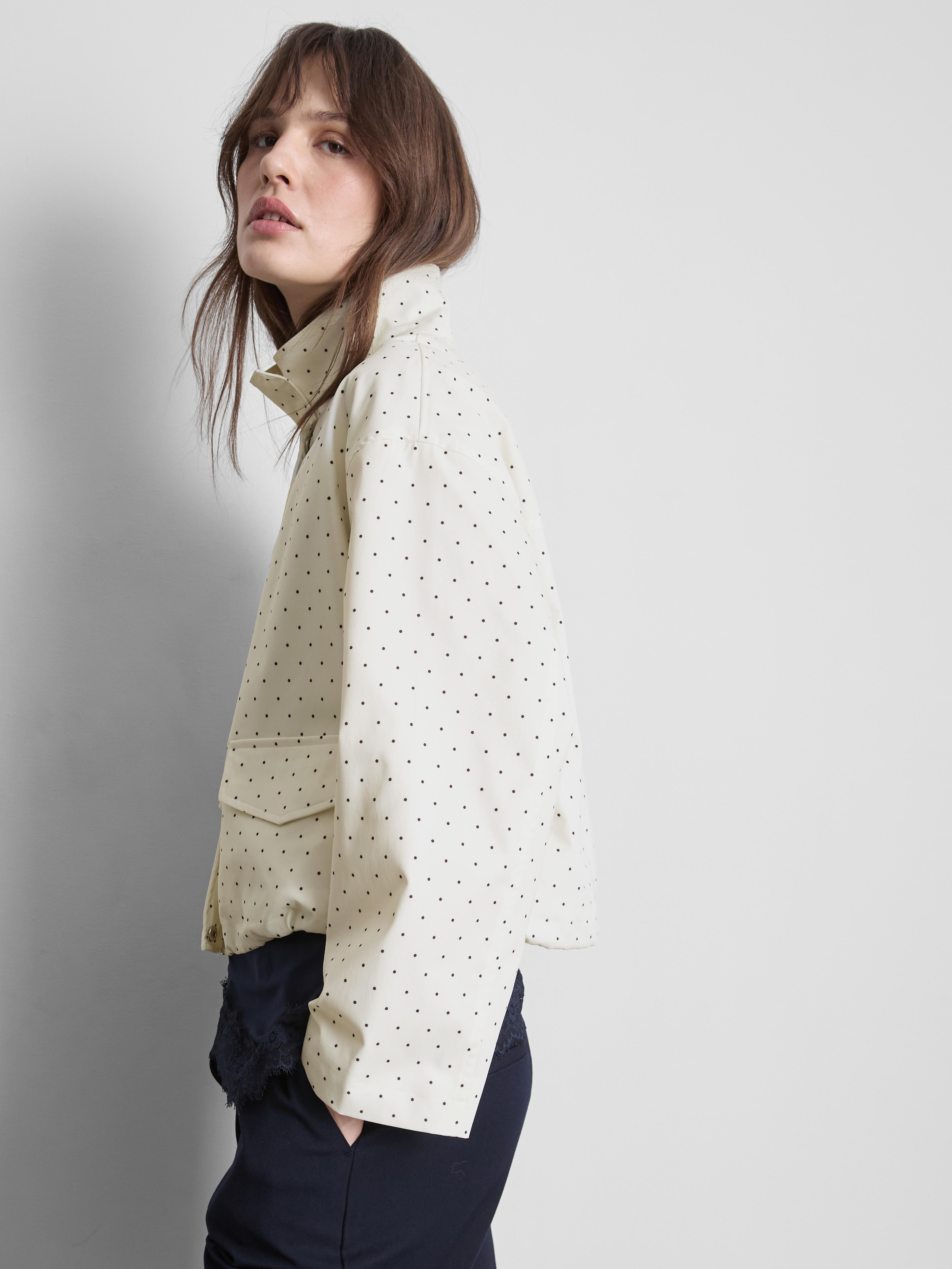 Veste à pois et col cheminée