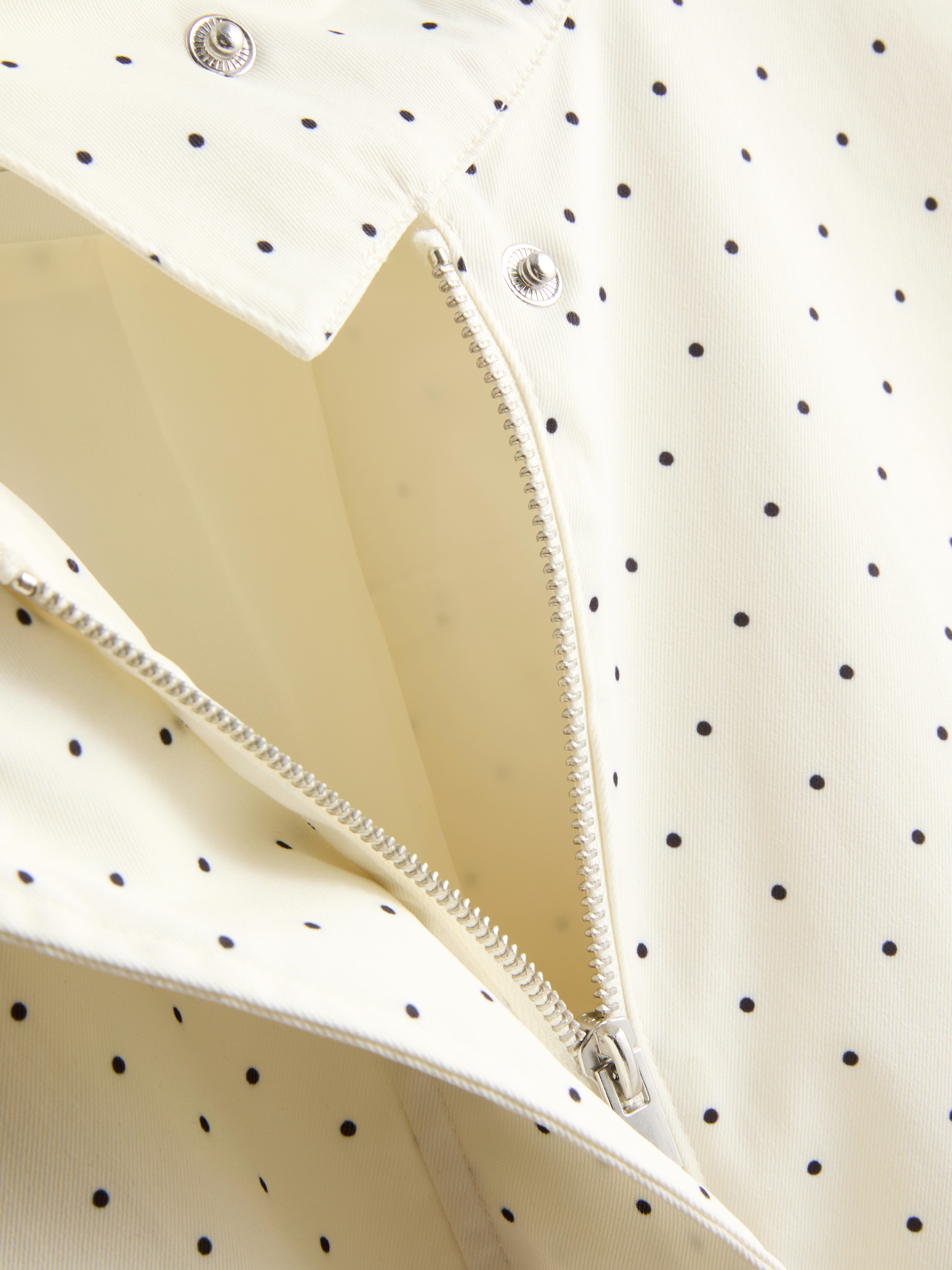 Veste à pois et col cheminée