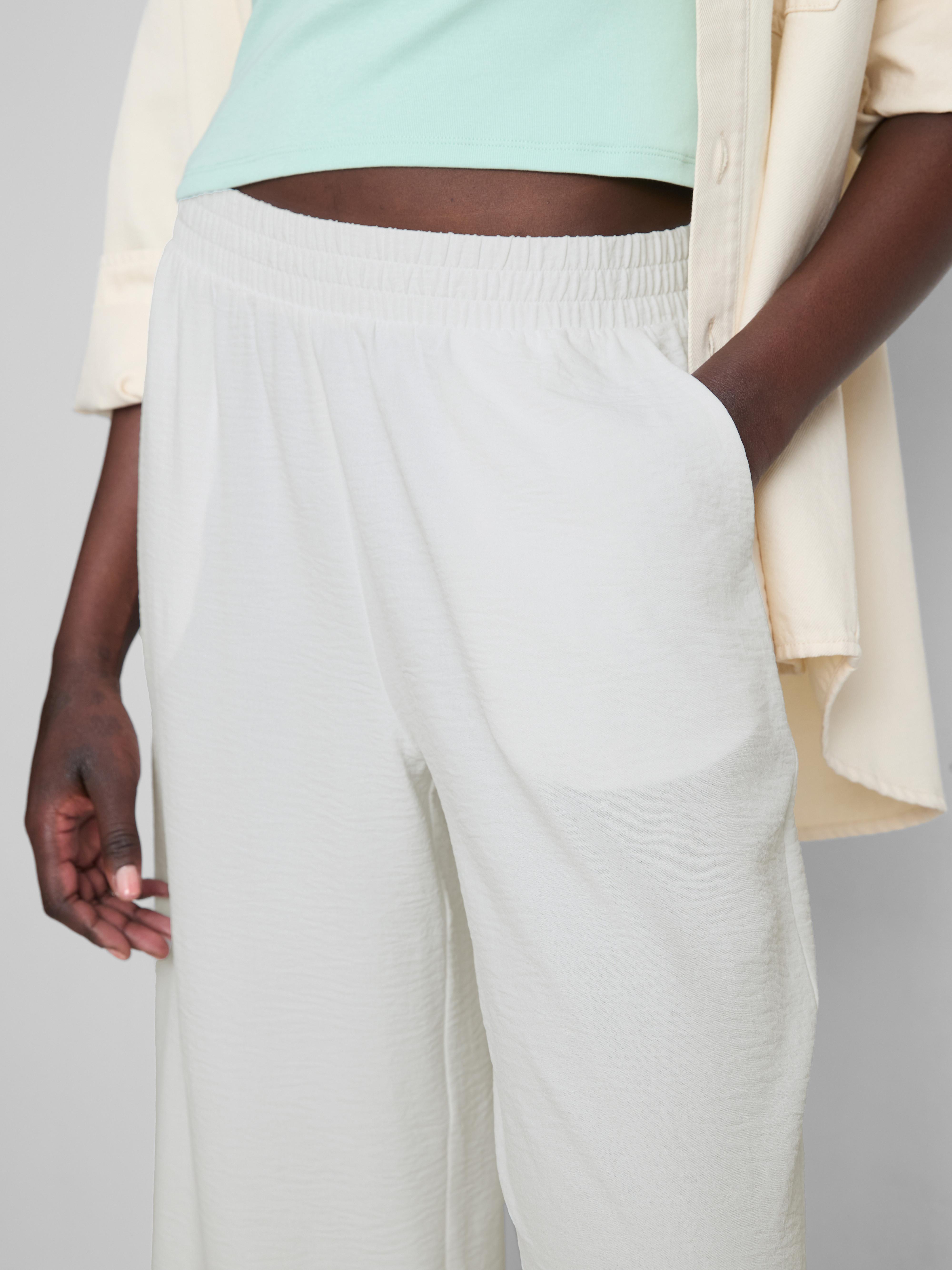Pantalones de pernera ancha con cintura elástica