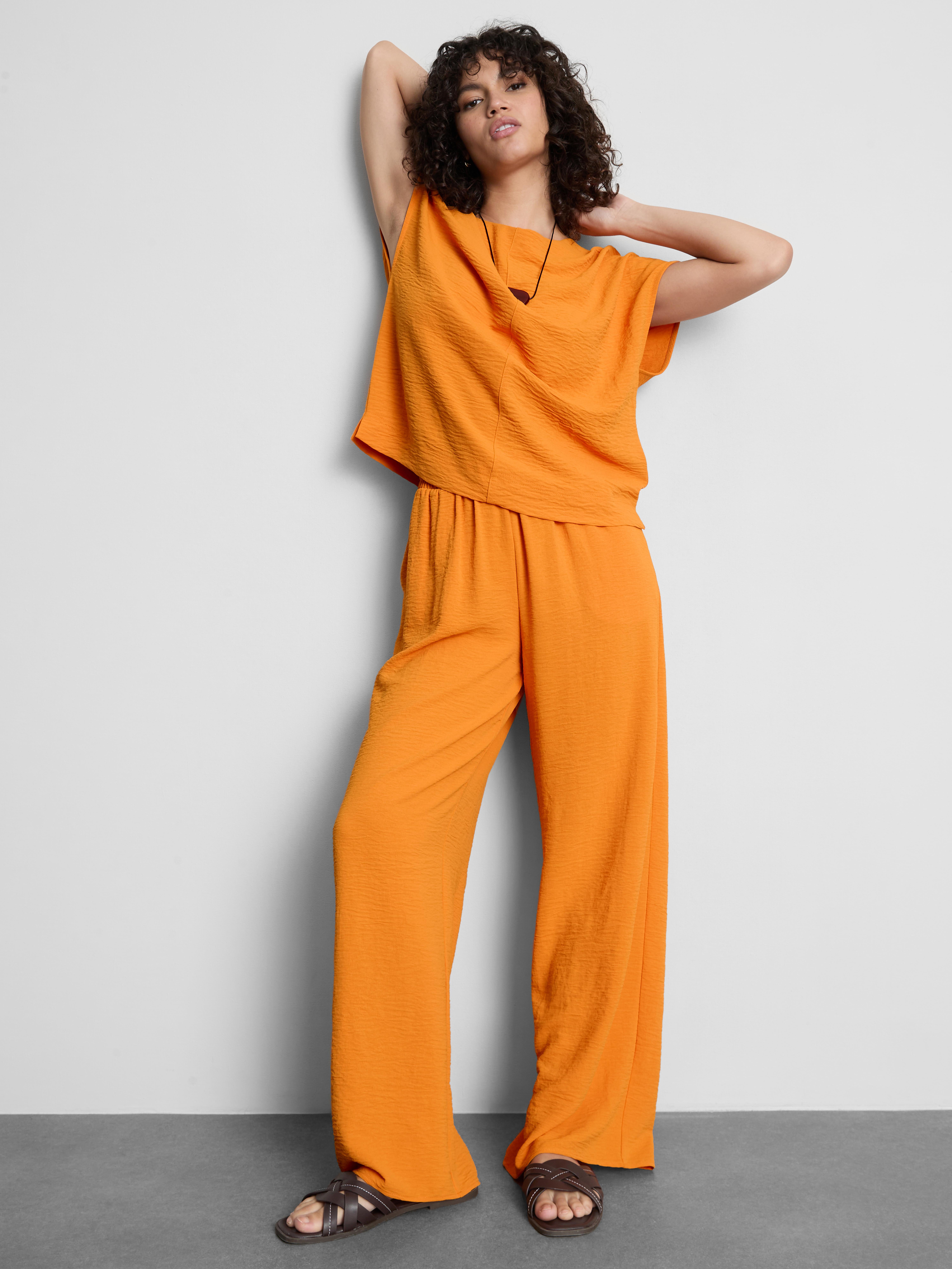 Pantalones de pernera ancha con cintura elástica Naranja