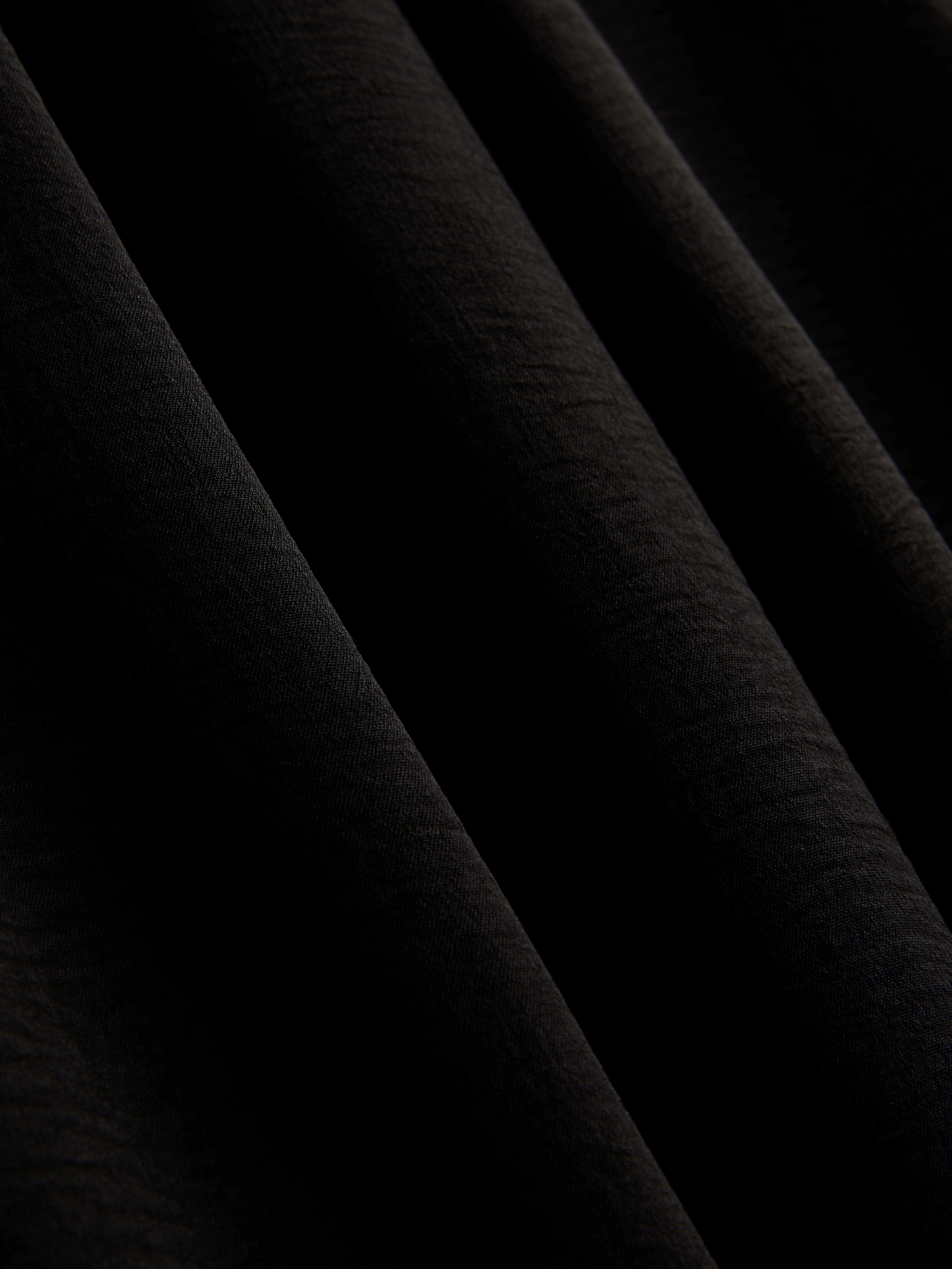 Pantalones de pernera ancha con cintura elástica