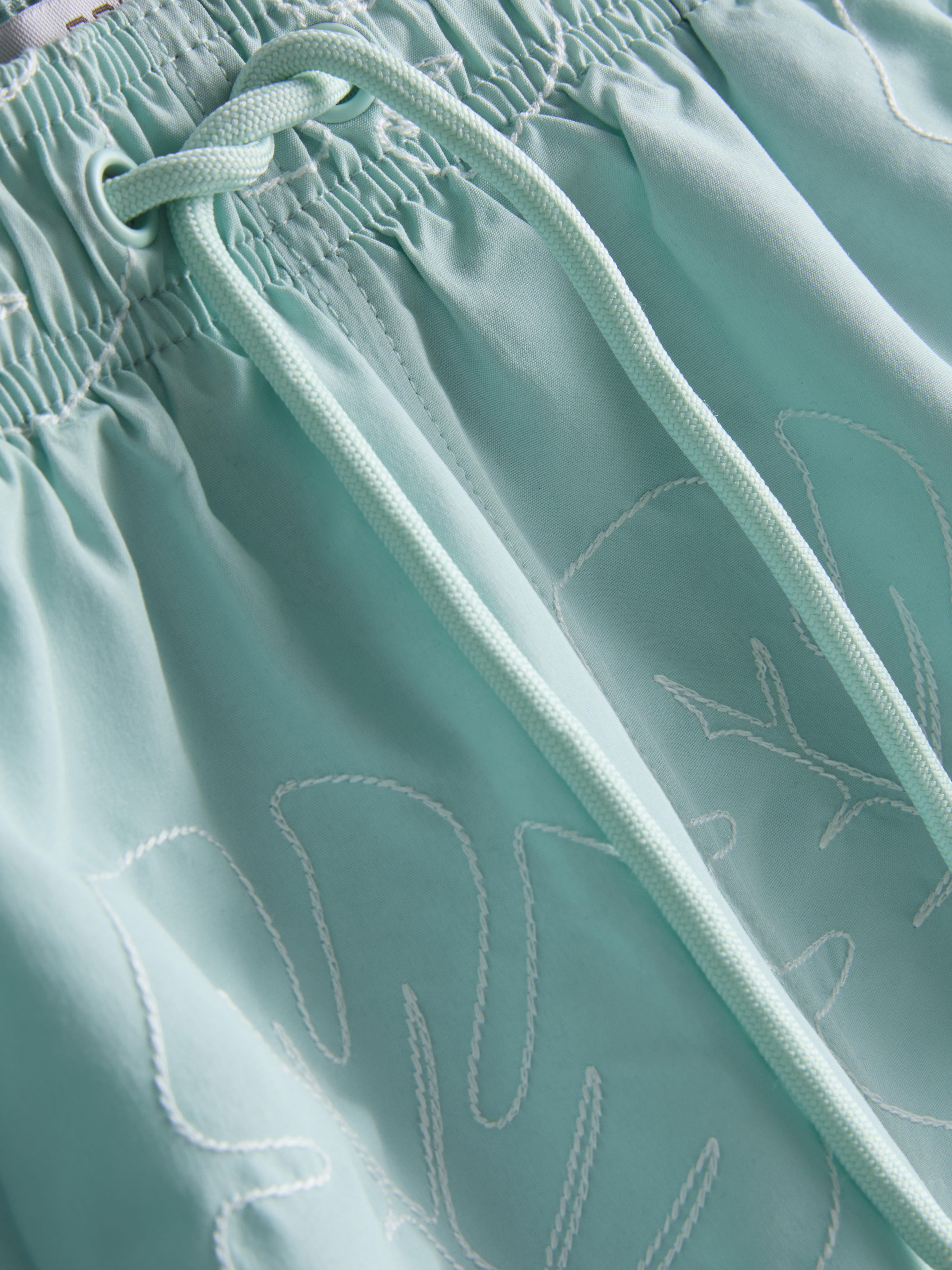 Leaf Embroidered Swimming Shorts