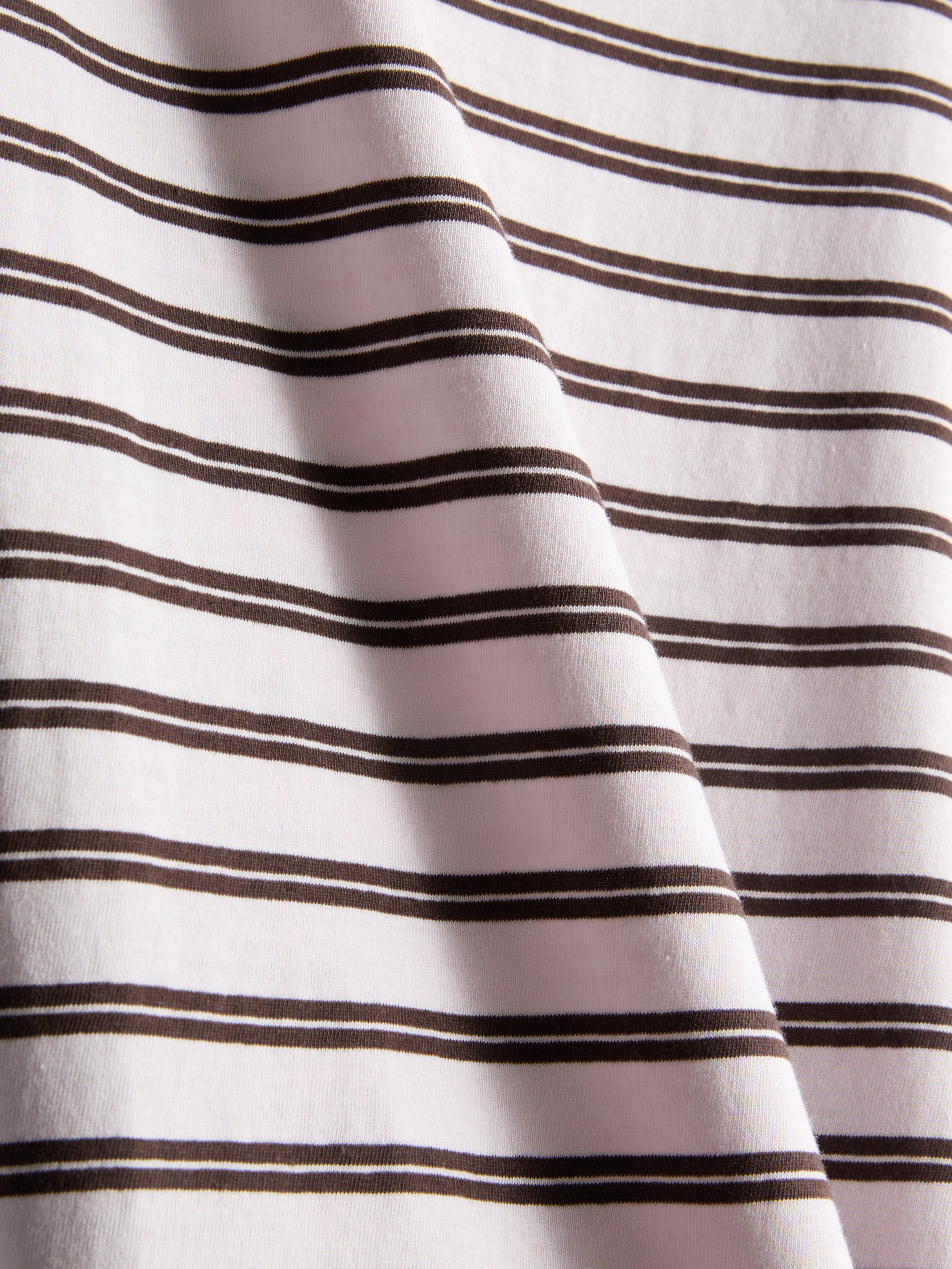 Camiseta de algodón a rayas con cuello redondo