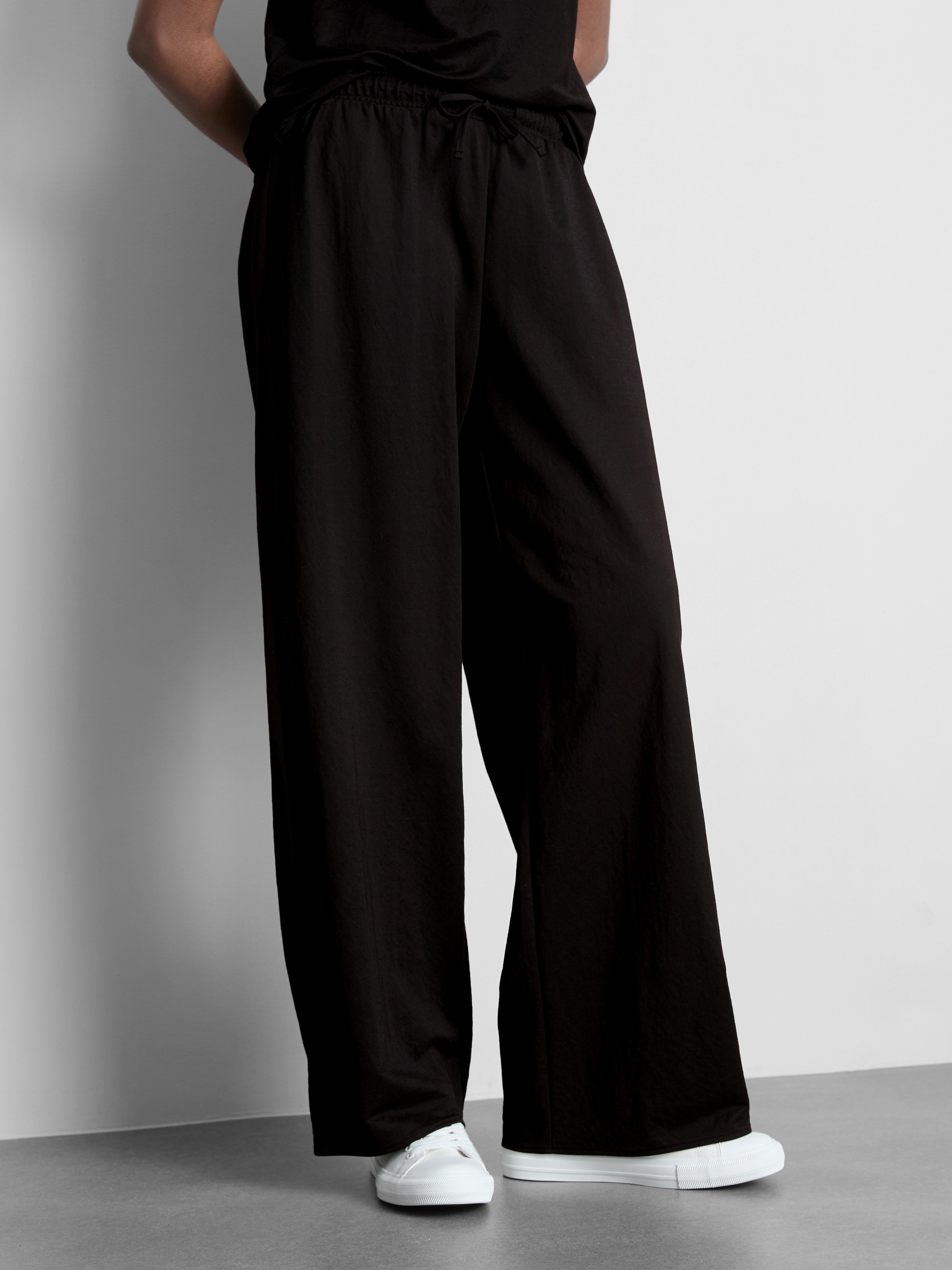 Pantalones de pernera ancha con textura