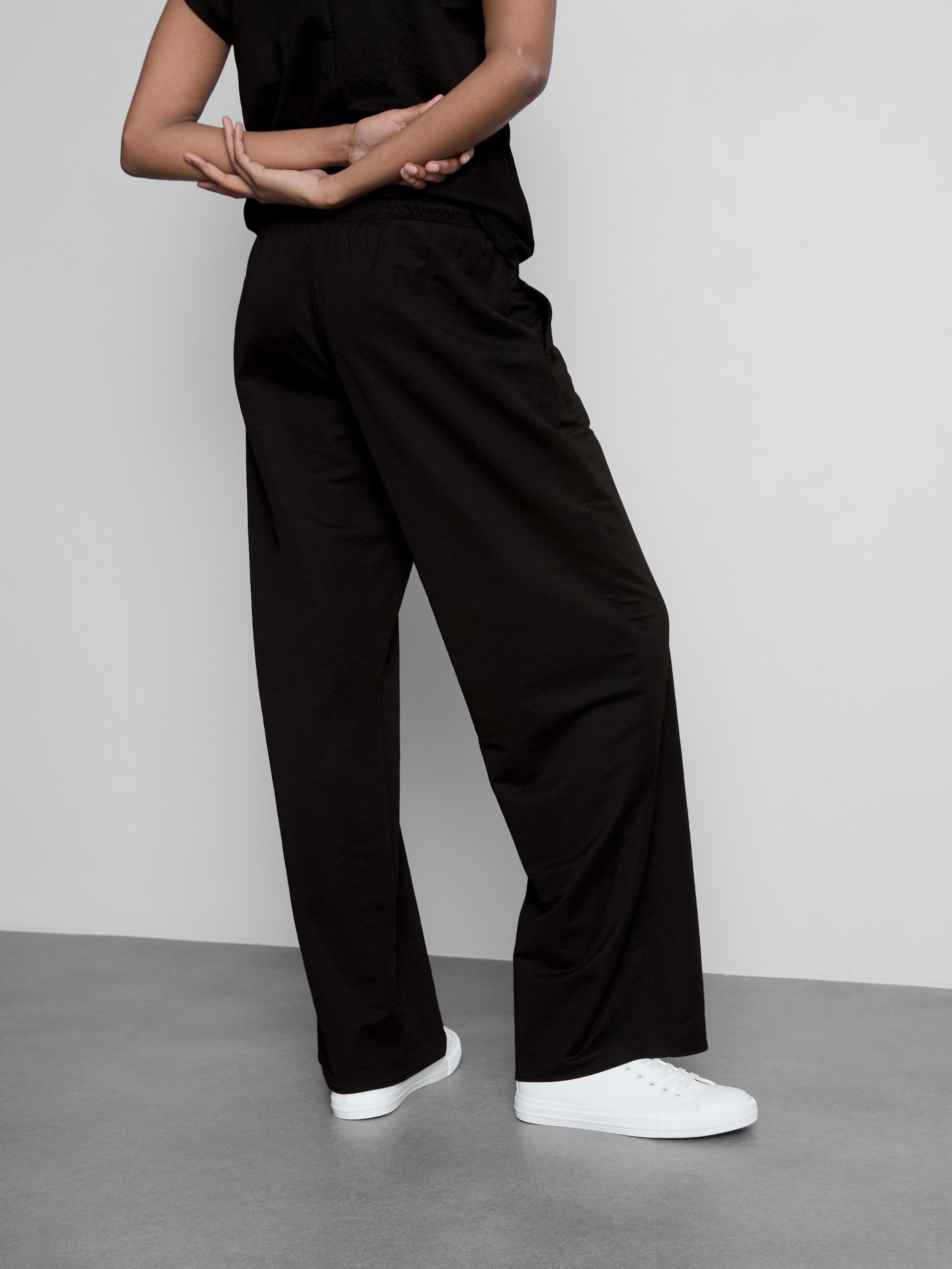 Pantalones de pernera ancha con textura