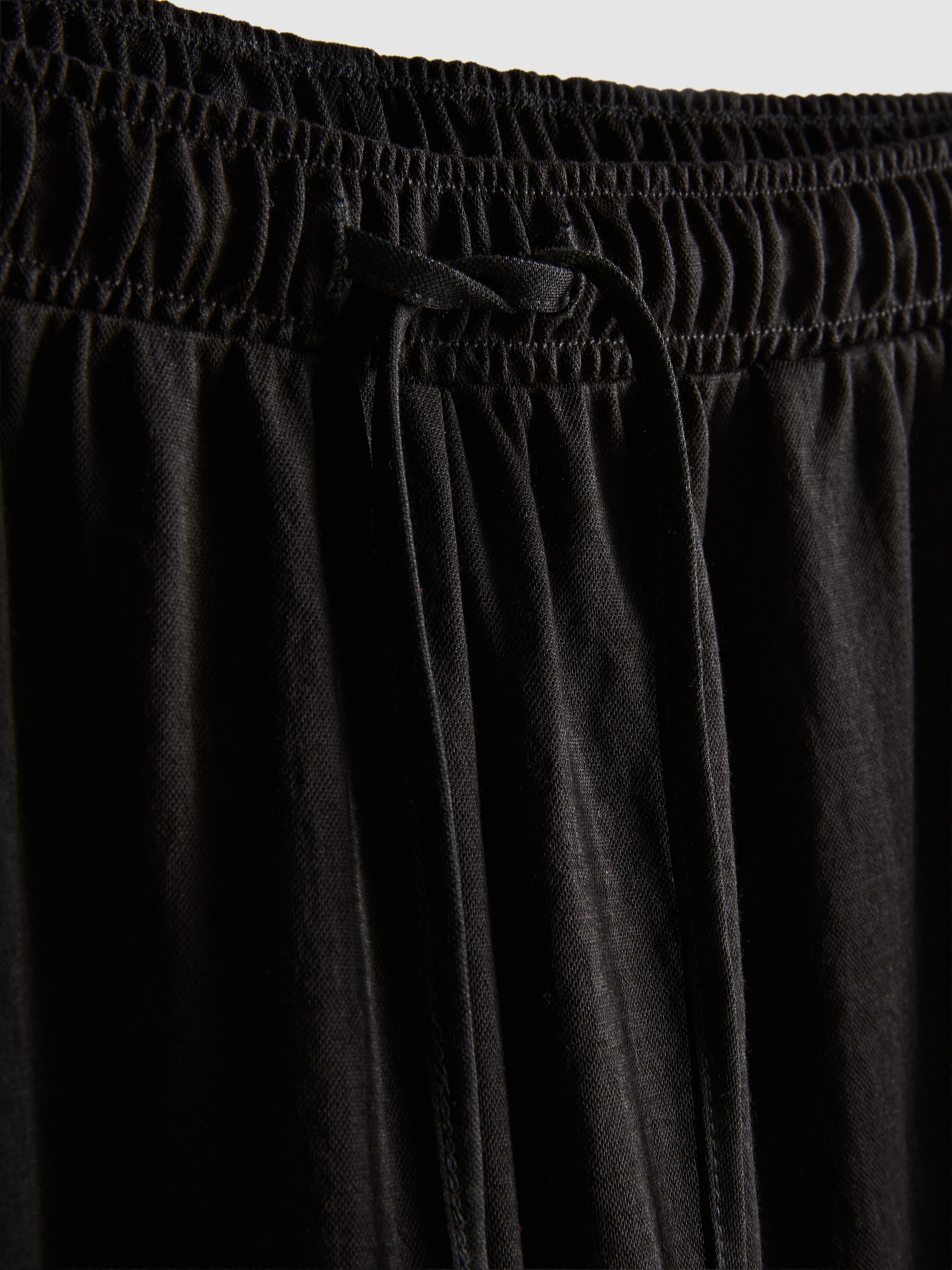 Pantalones de pernera ancha con textura