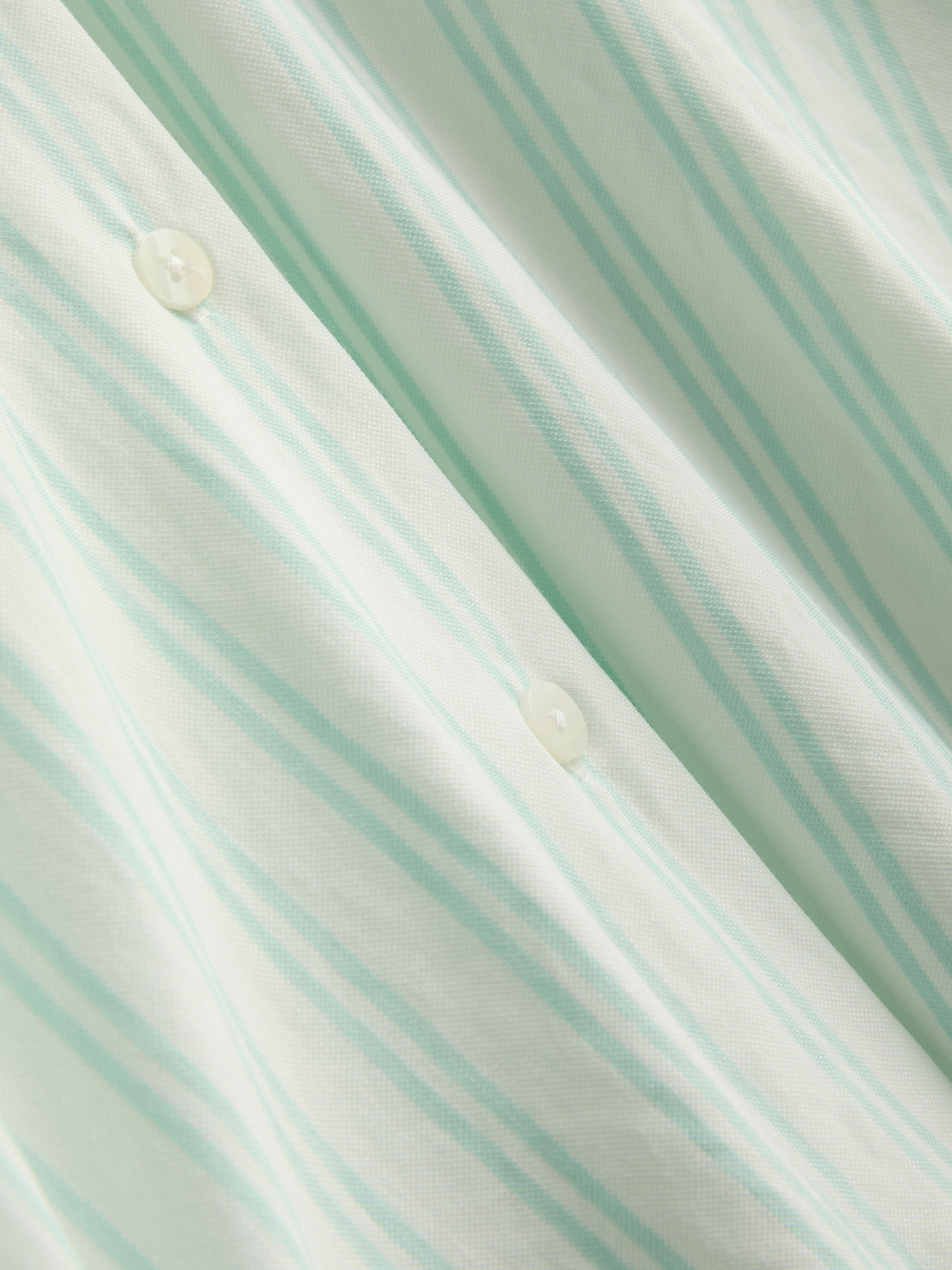 Chemise décontractée à ourlet arrondi