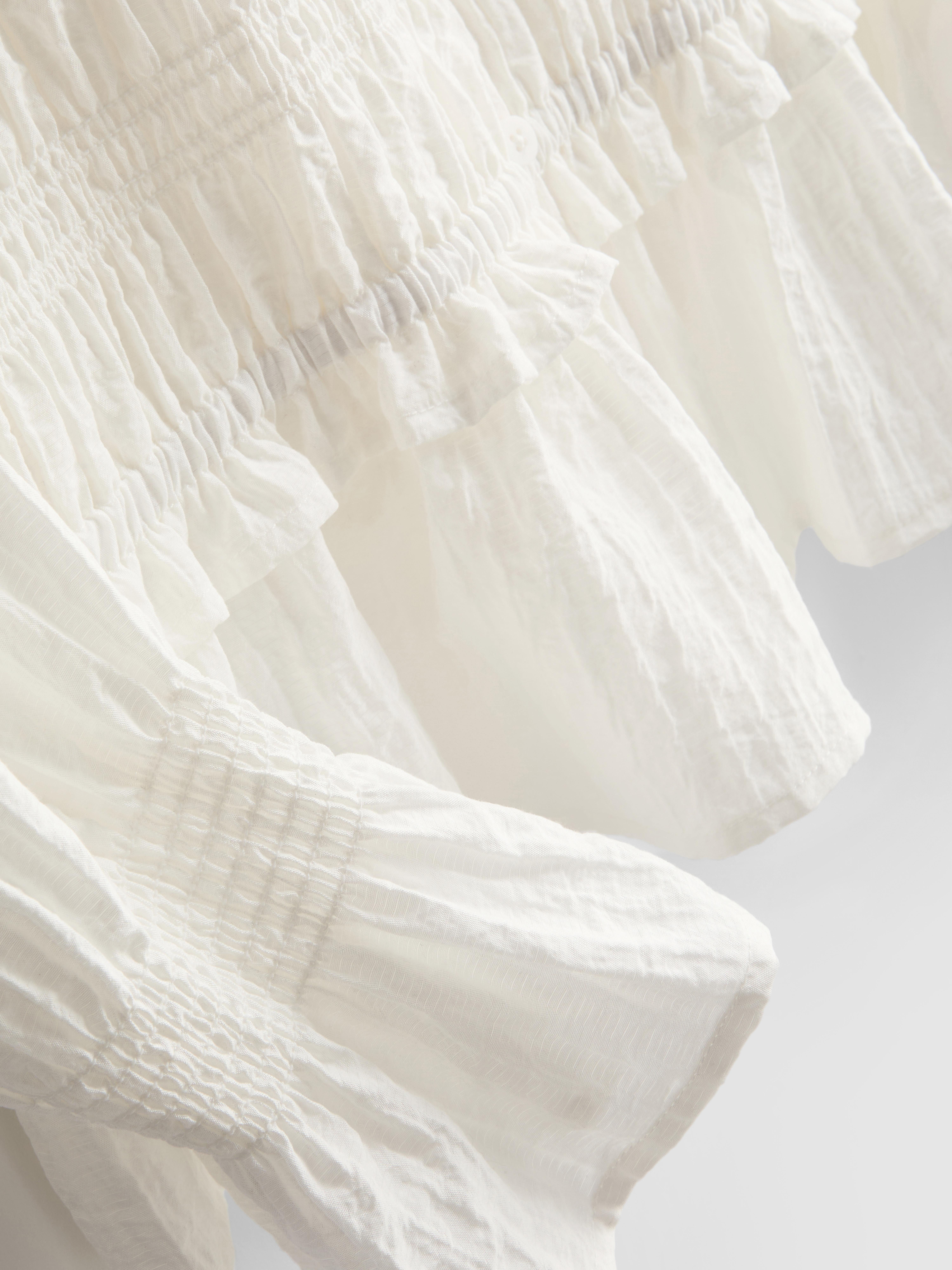 Shirred Peplum Hem Blouse