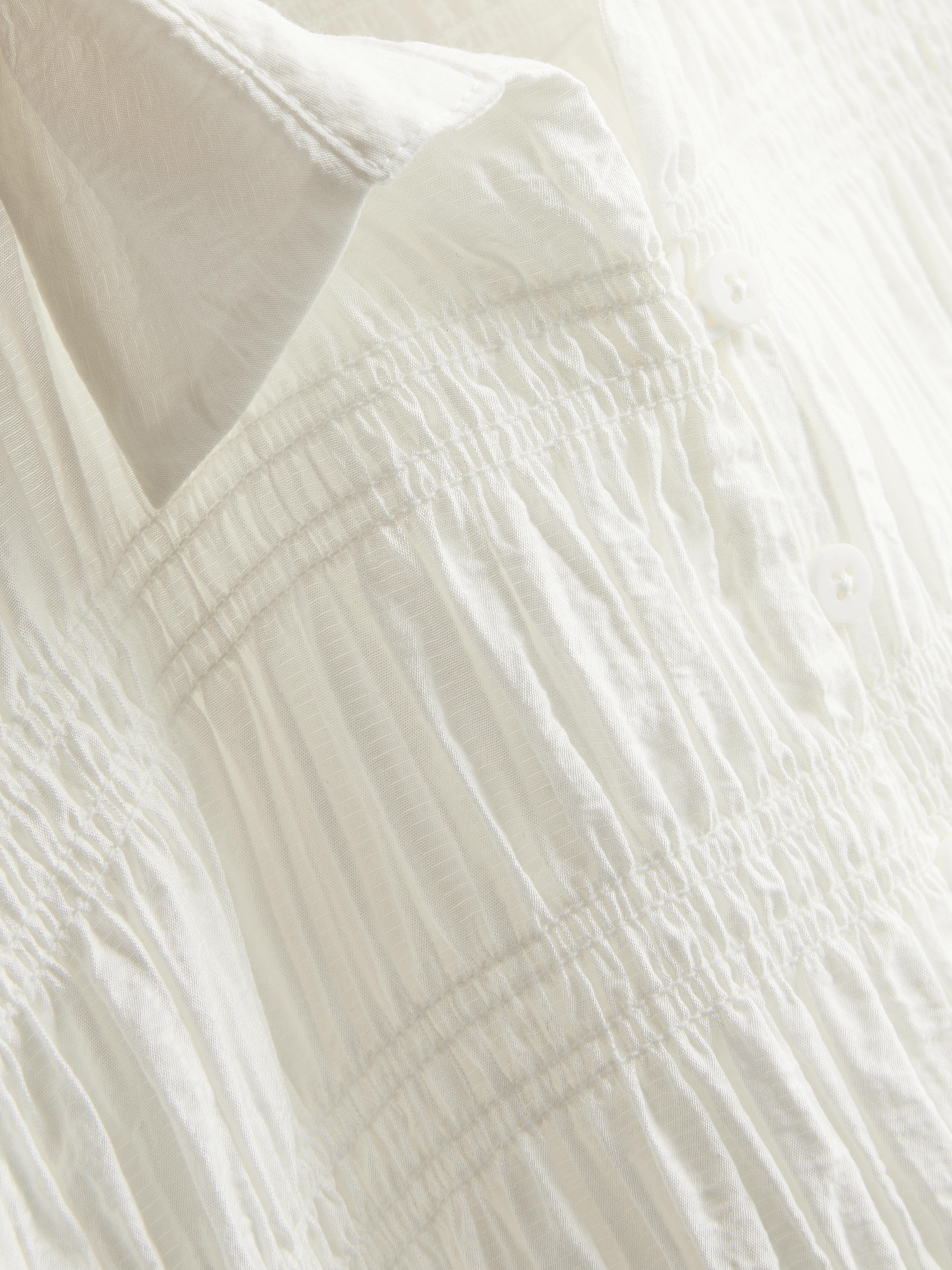 Shirred Peplum Hem Blouse