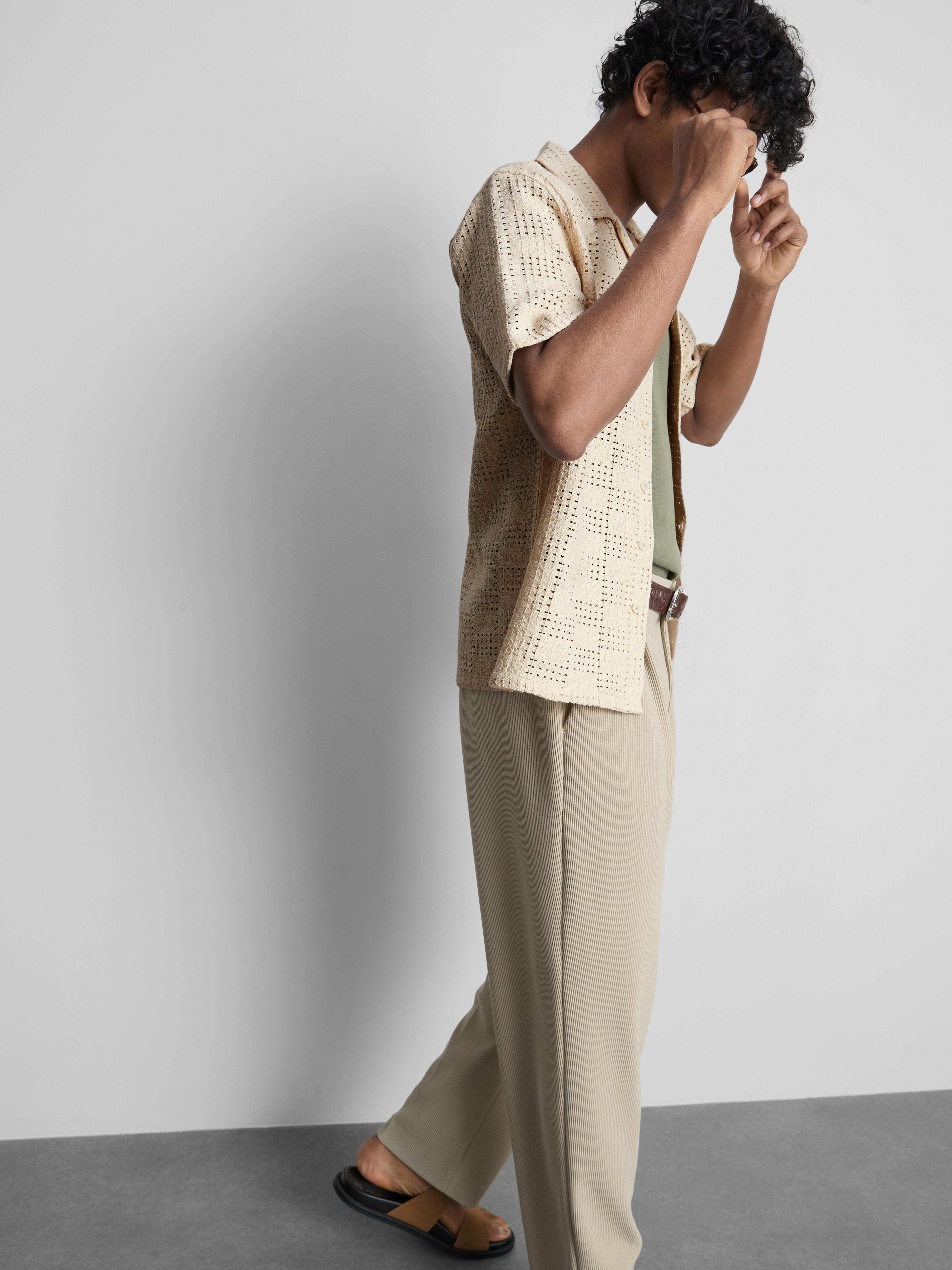 Kvačkana srajca s karirastim motivom