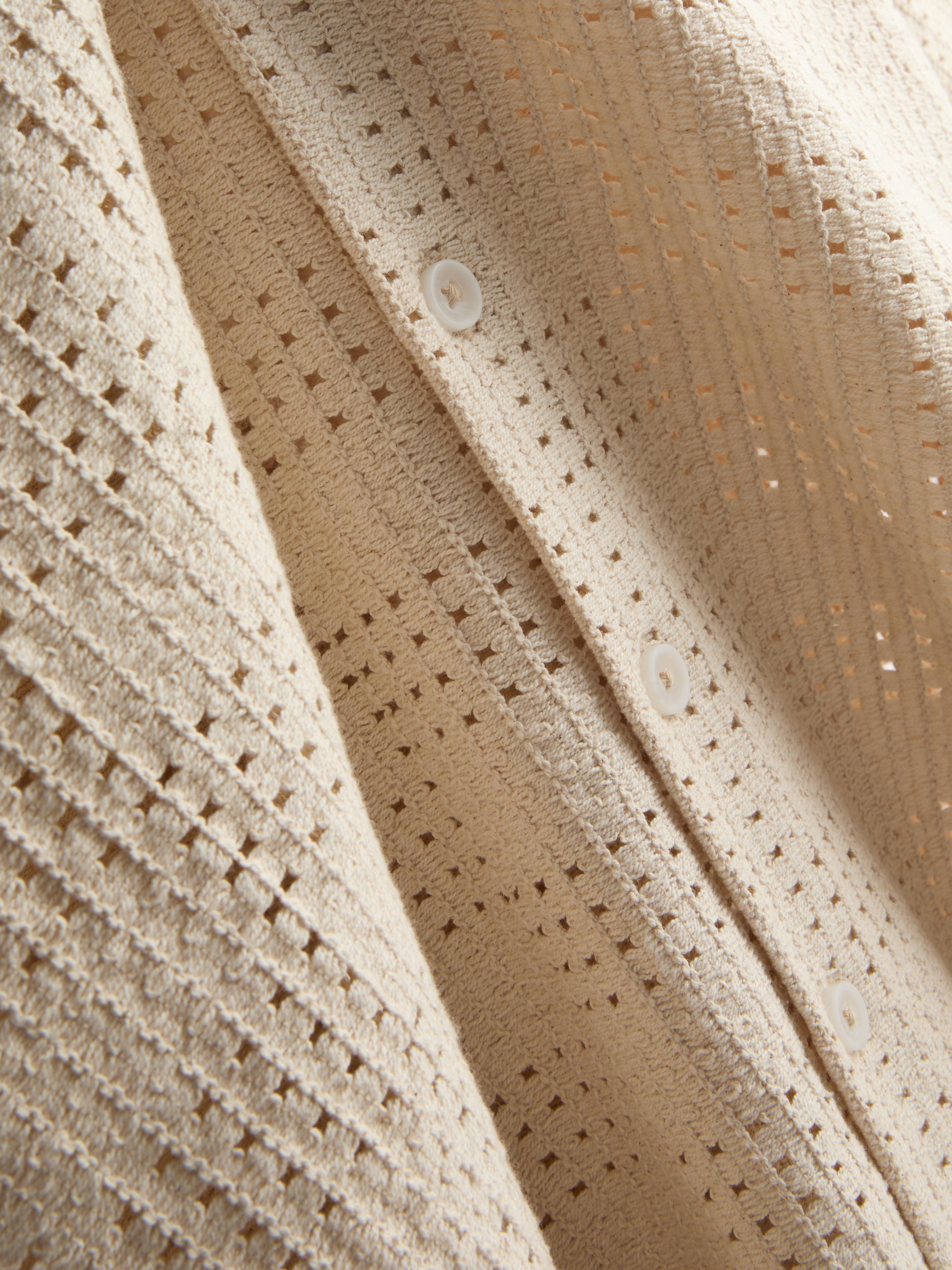 Kvačkana srajca s karirastim motivom