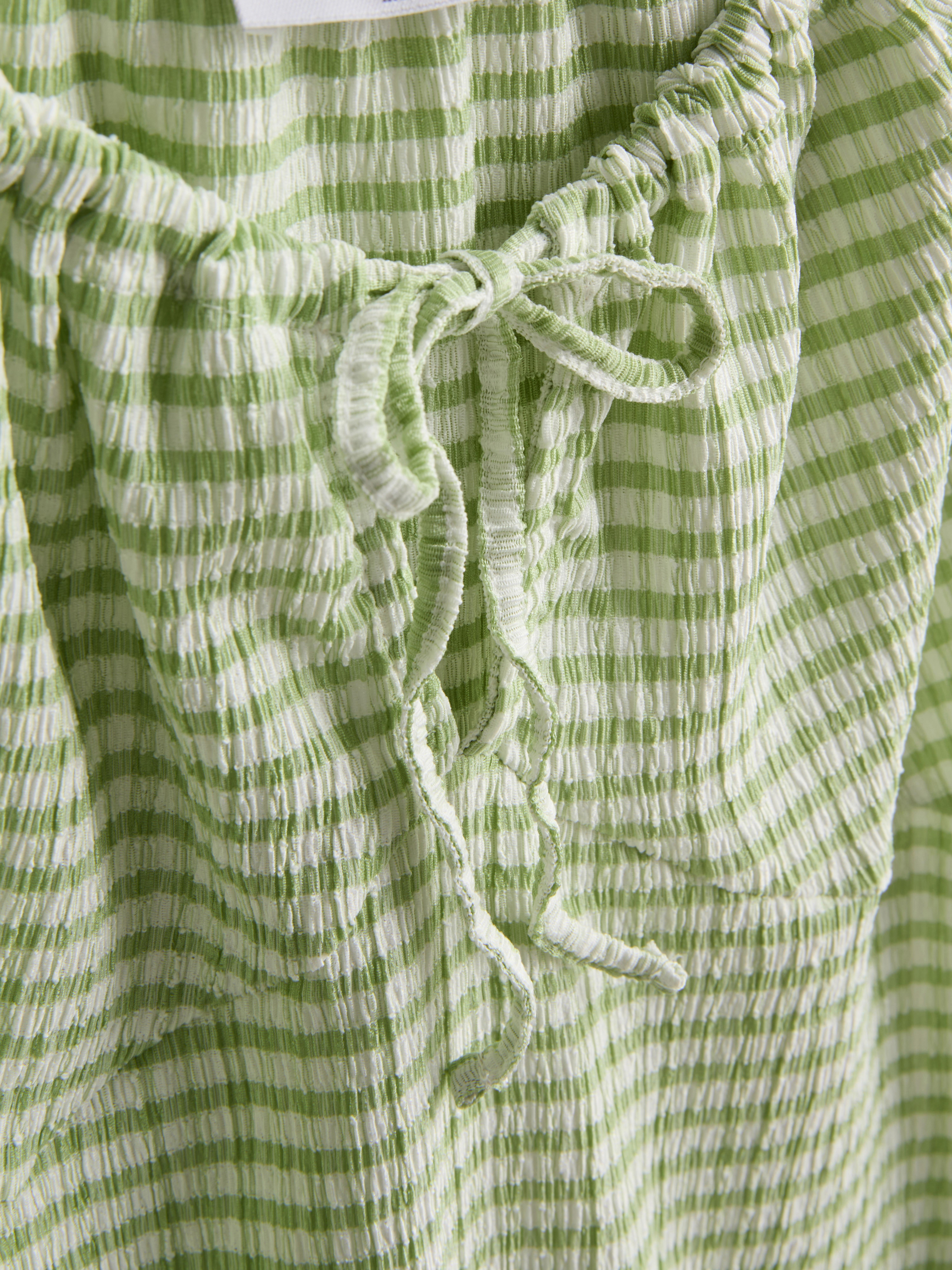 slim fit dress slacks SUNNEI: Green Crinkle Pleat Maxi Dress main image 0
