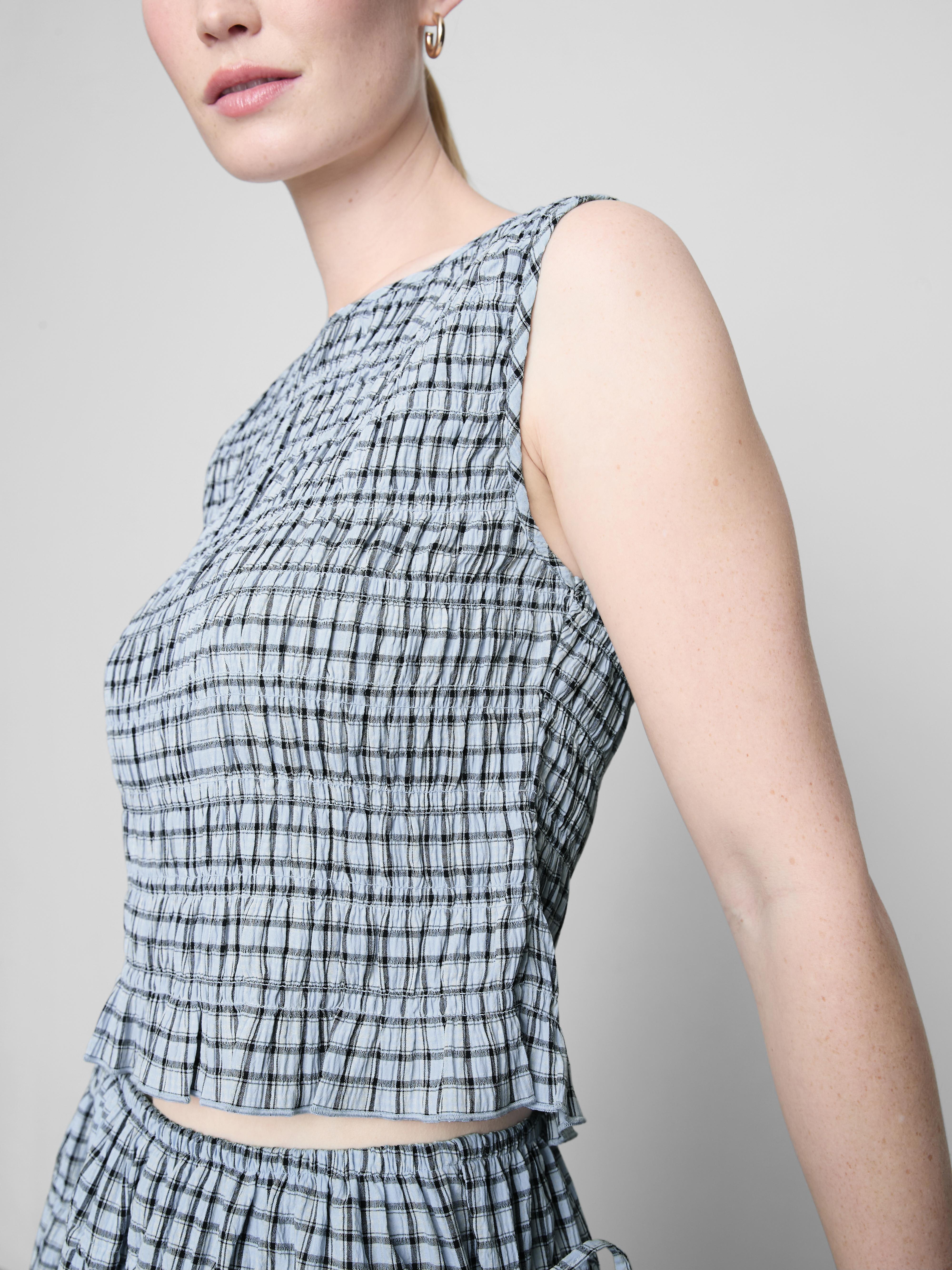 Mouwloze gesmokte tanktop