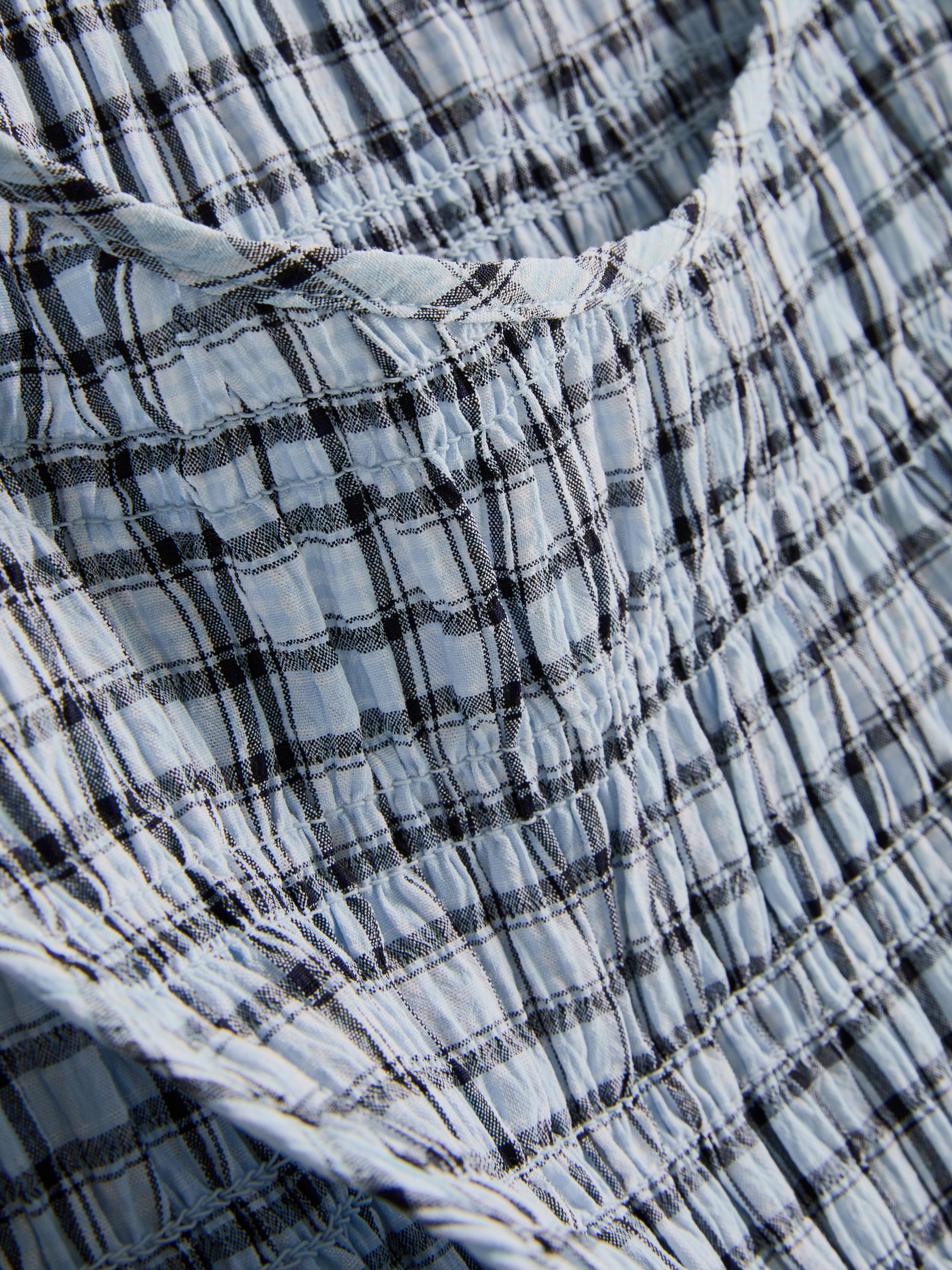 Mouwloze gesmokte tanktop