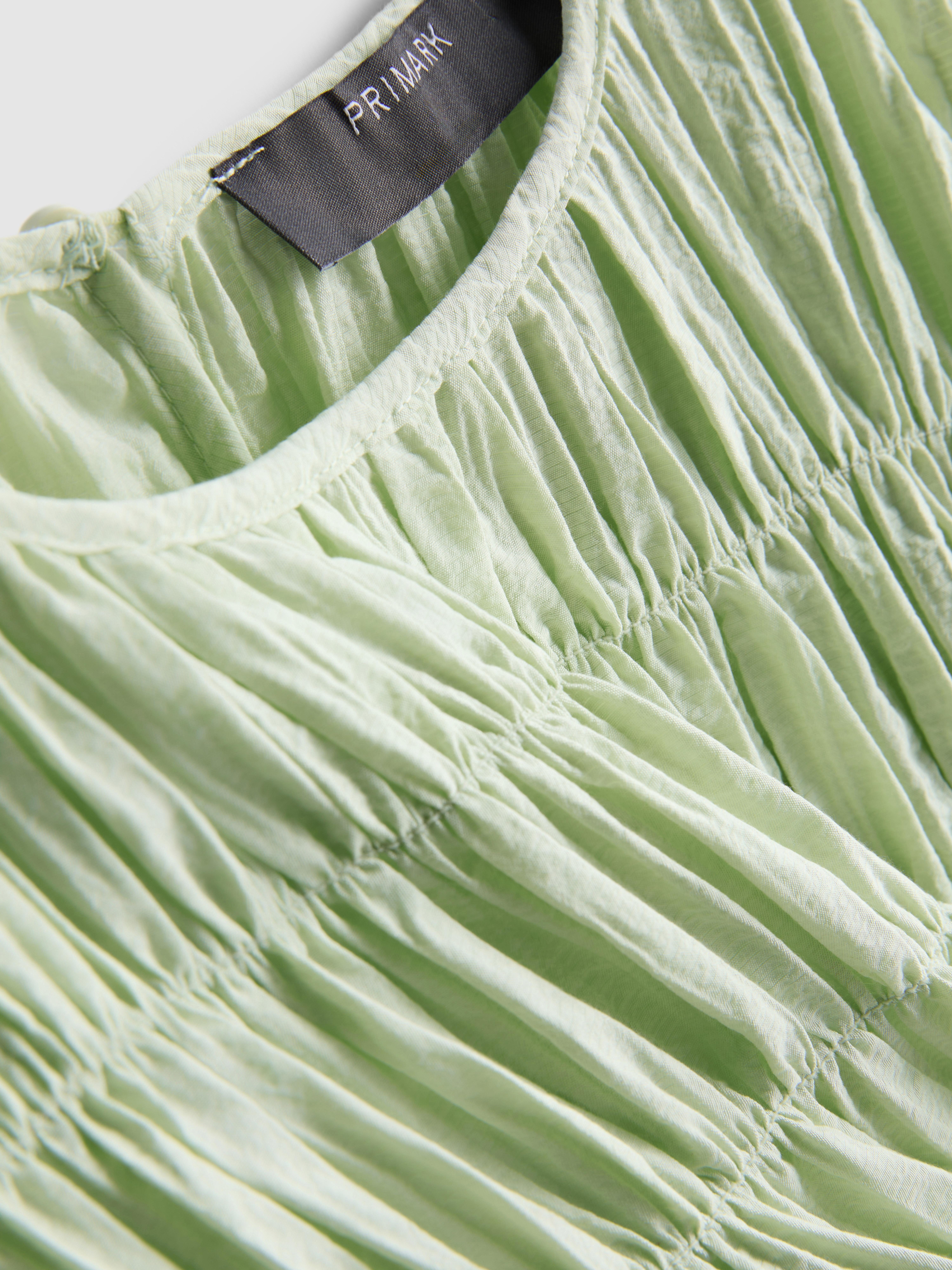 Haut froncé à manches courtes