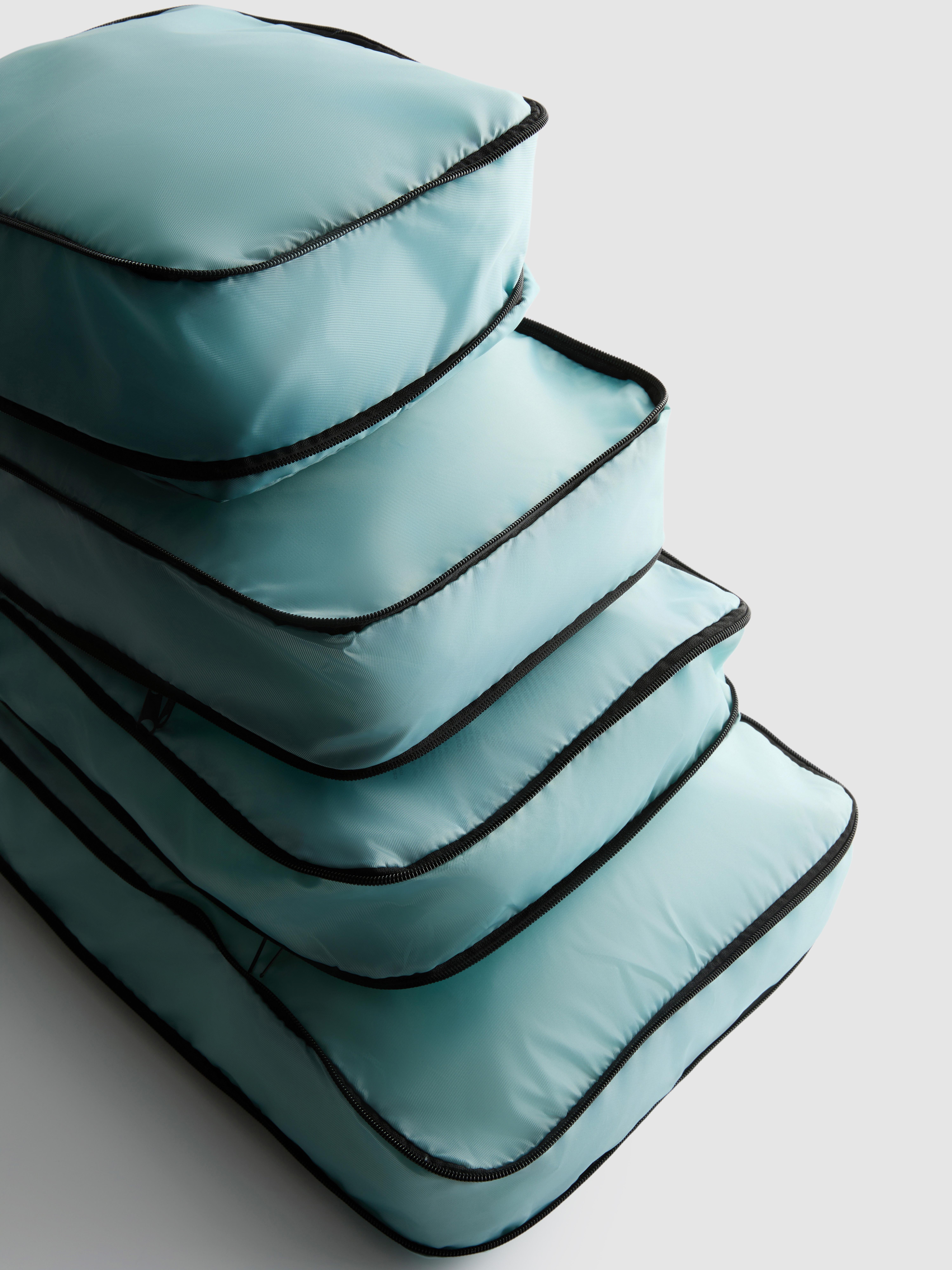 4 cestovní kompresní kostky