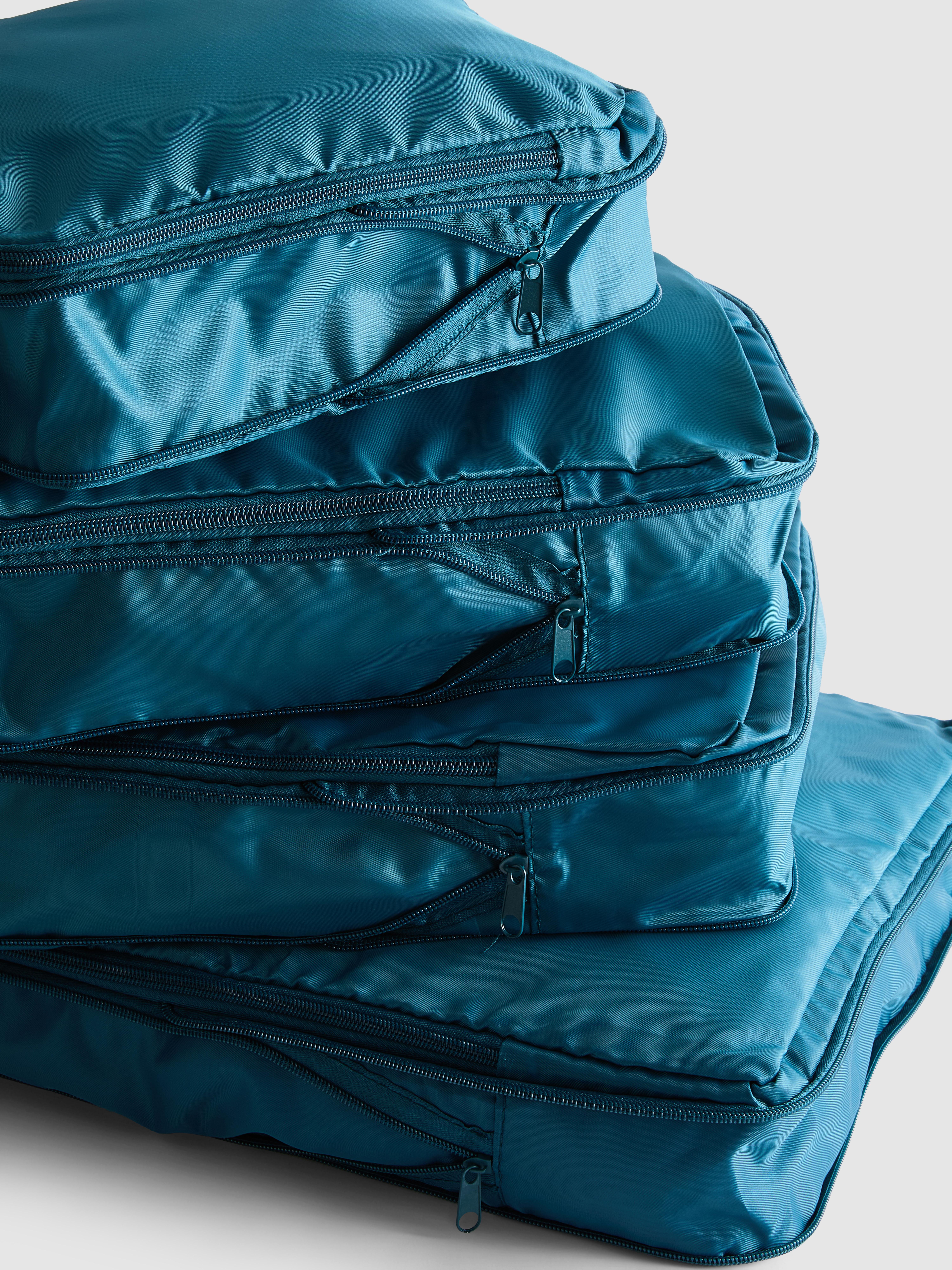 Pack de 4 bolsas de compresión para equipaje - Color turquesa | Primark