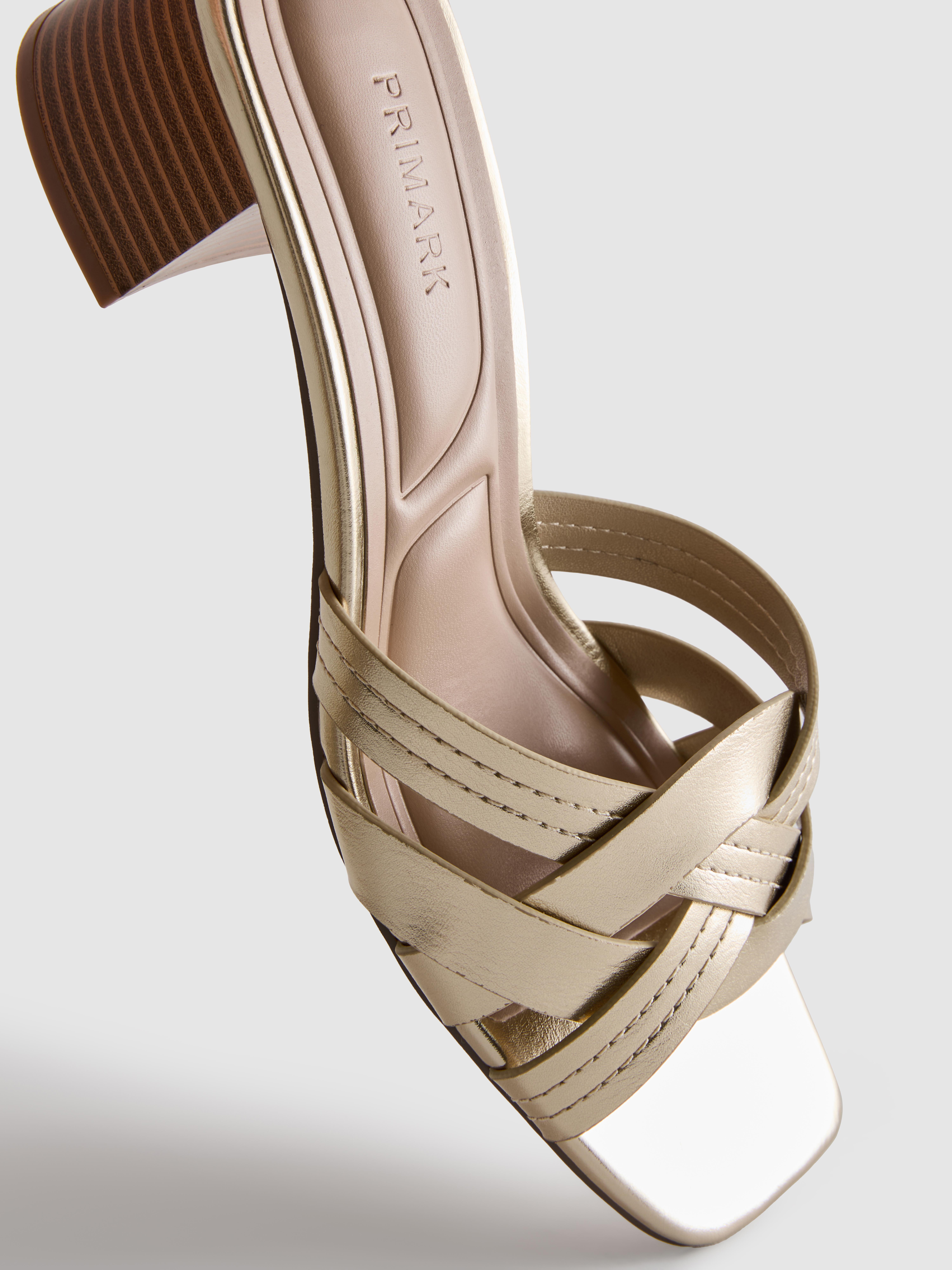 Muiltjes van imitatieleer met blokhak