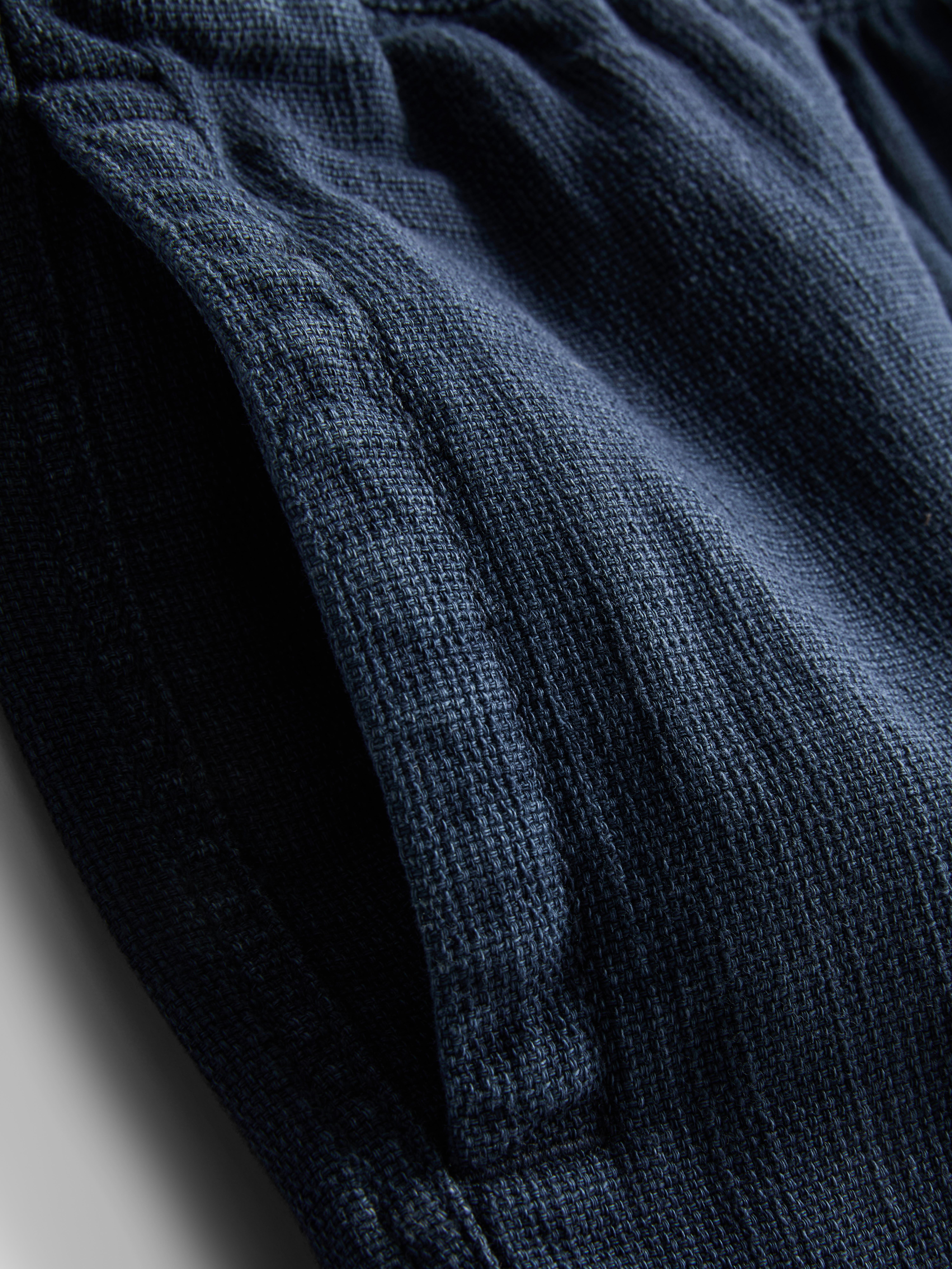 Šortky se stahovací šňůrkou a texturou