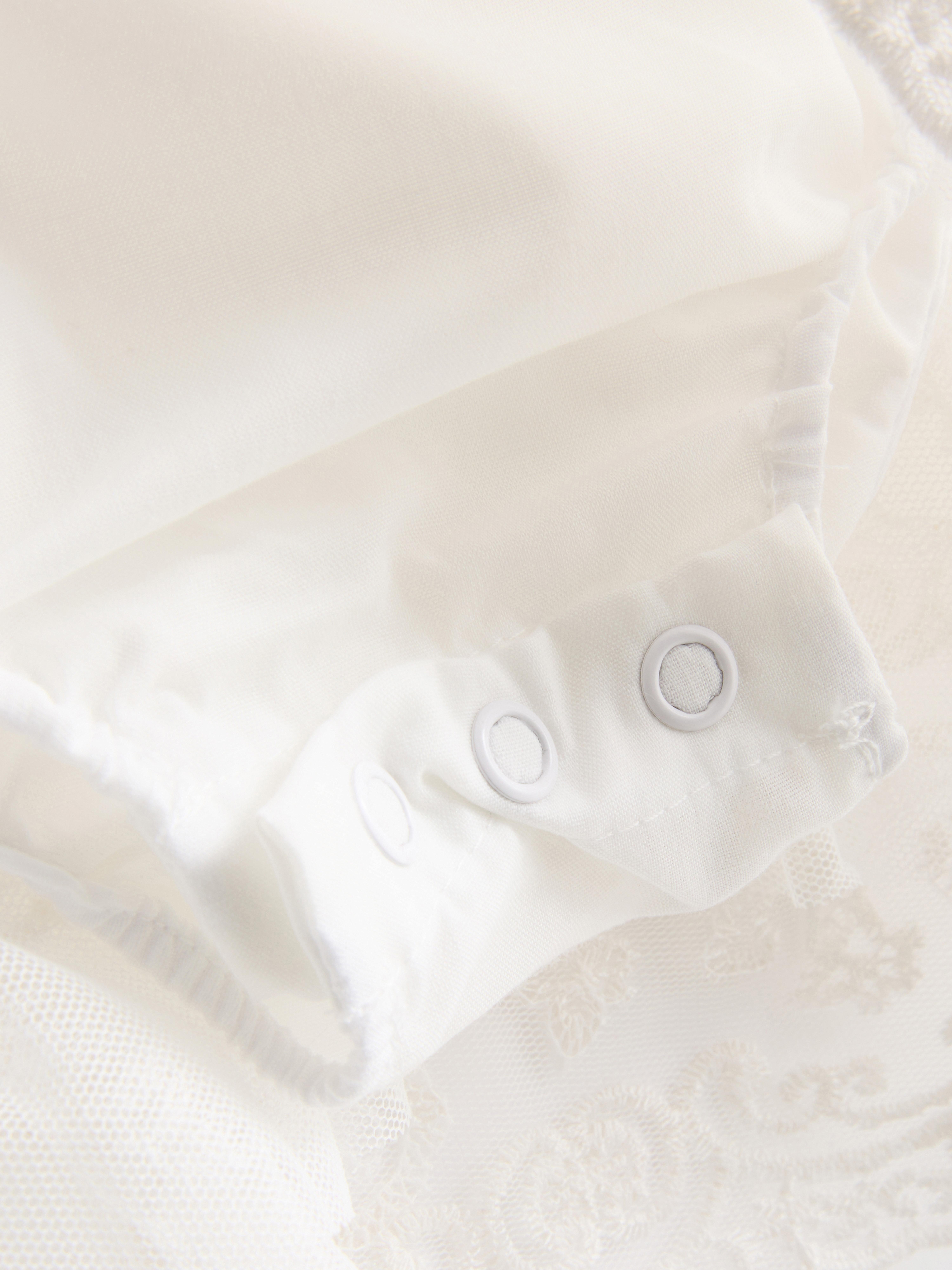 0-18 mesi | Abito neonato smock con volant The Edit