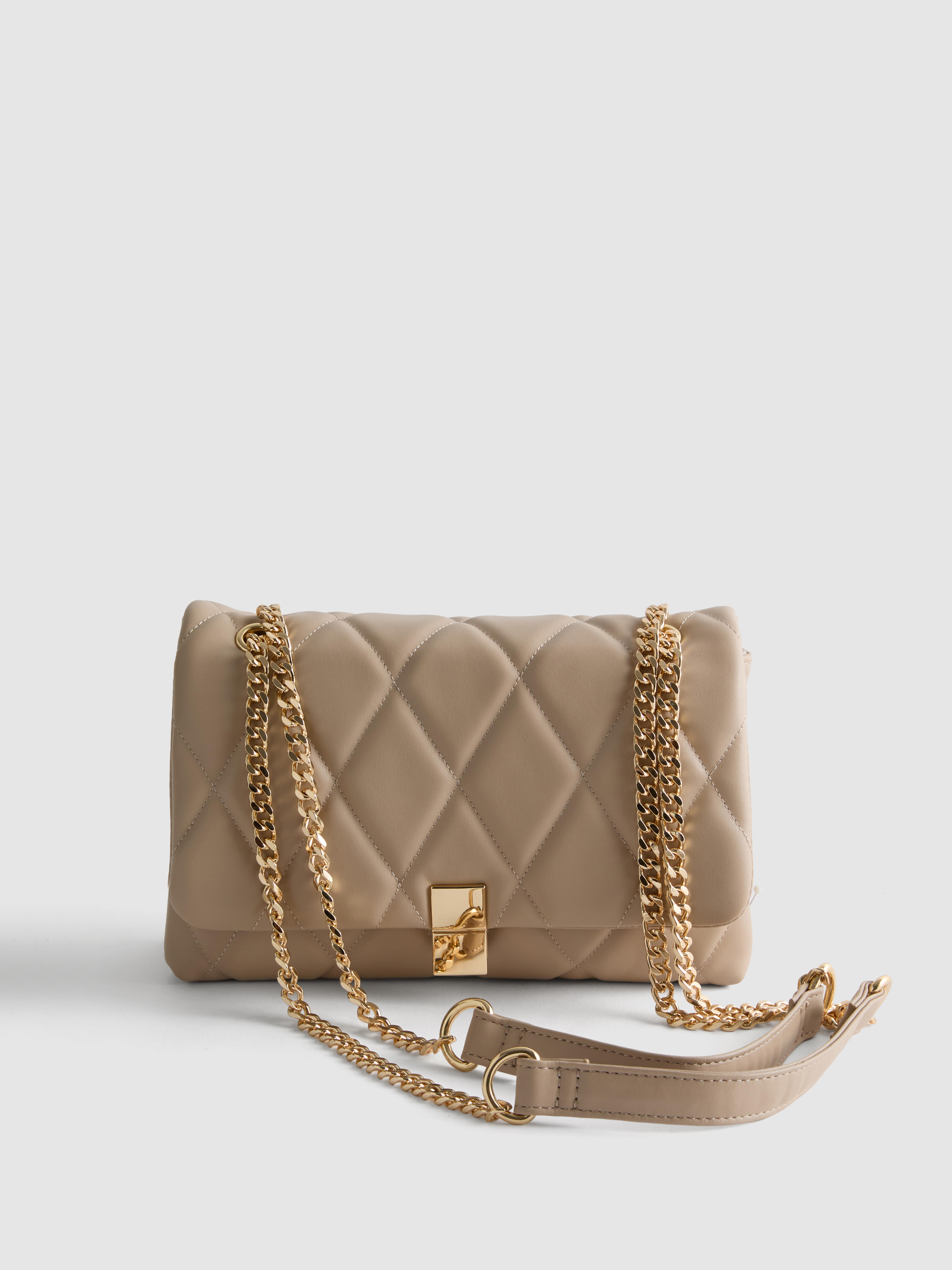 Pikowana torba na ramię średniej wielkości