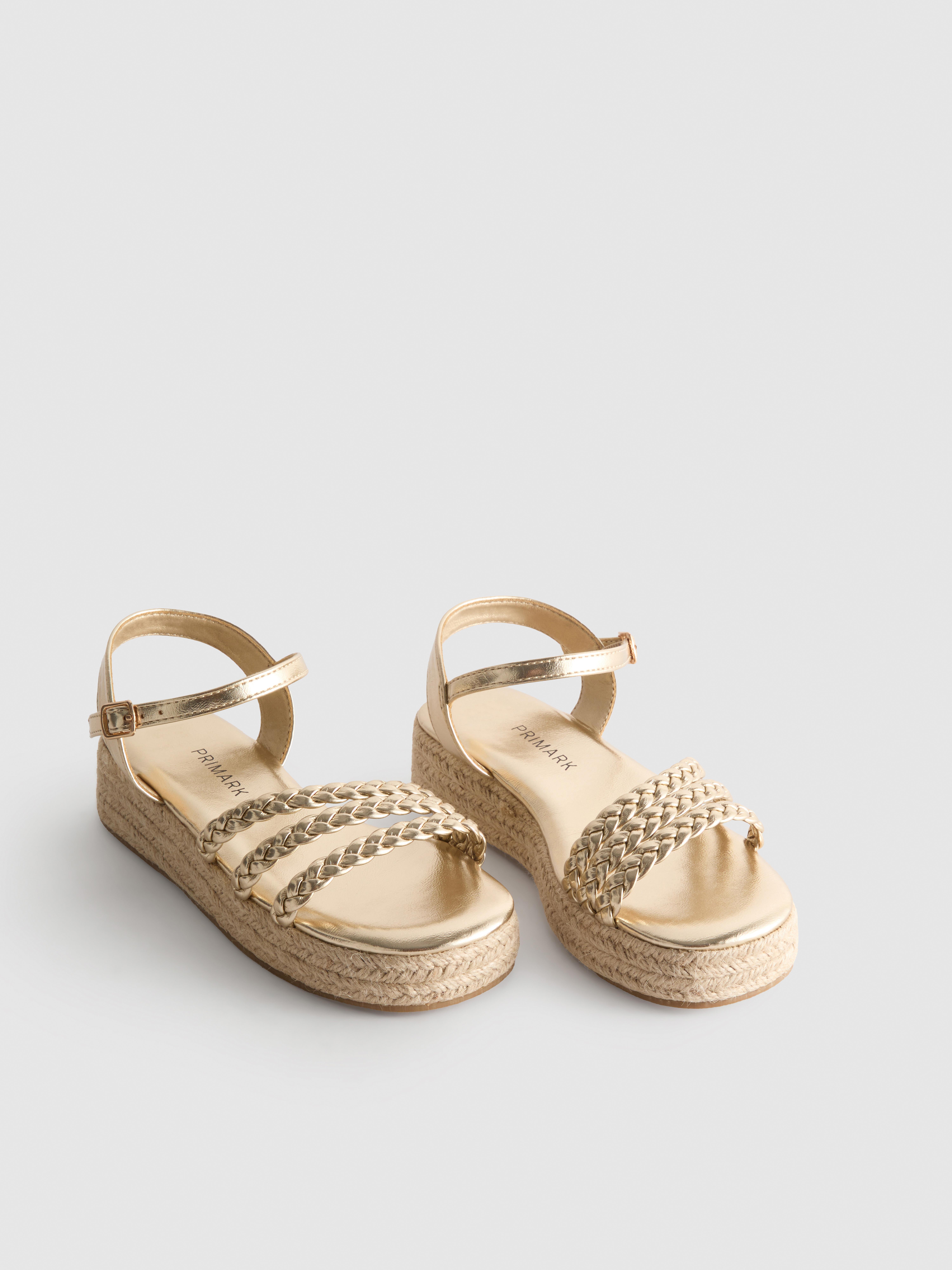 Sandalias tipo alpargata de cuña con tiras trenzadas