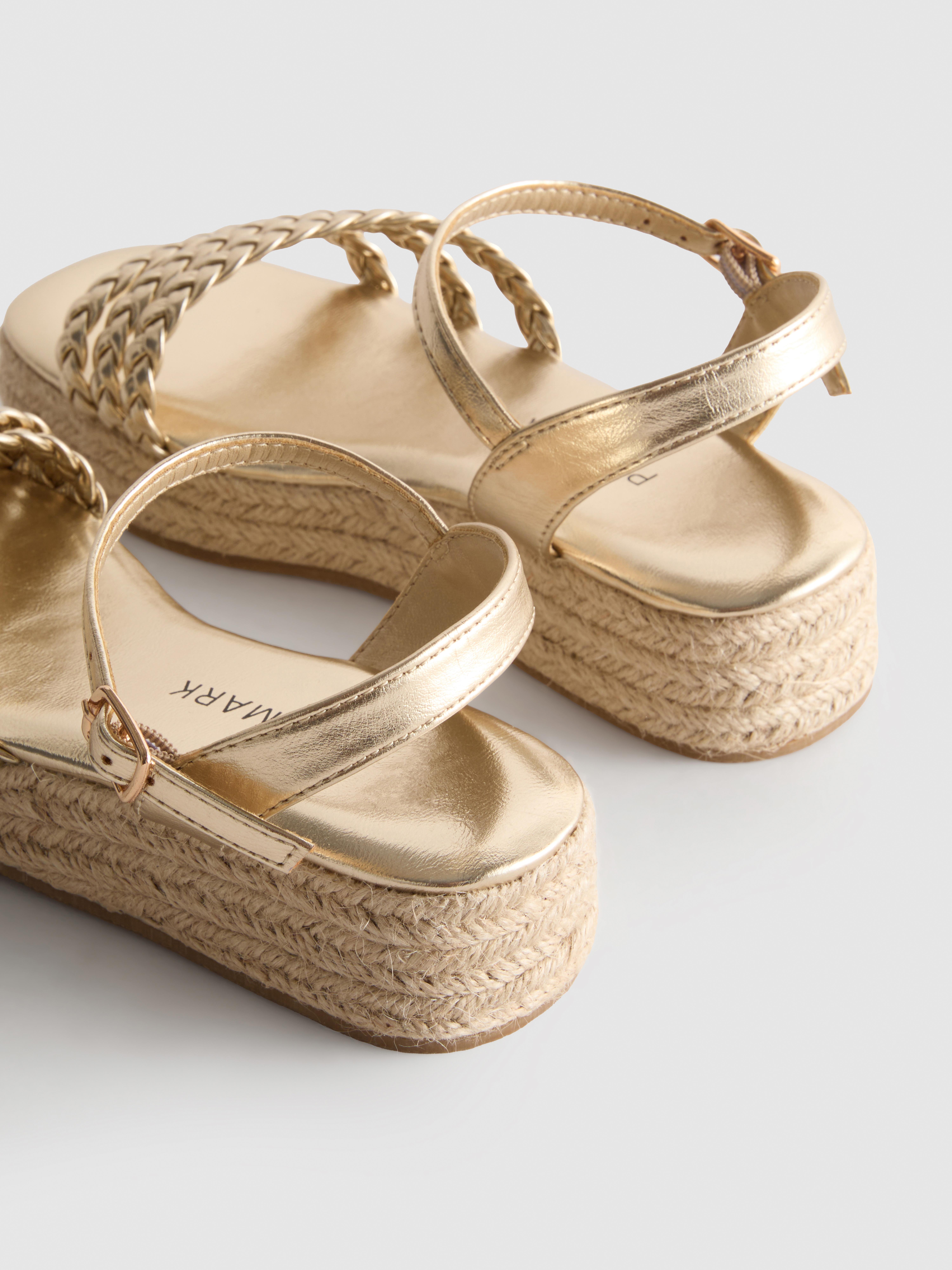 Sandalias tipo alpargata de cuña con tiras trenzadas