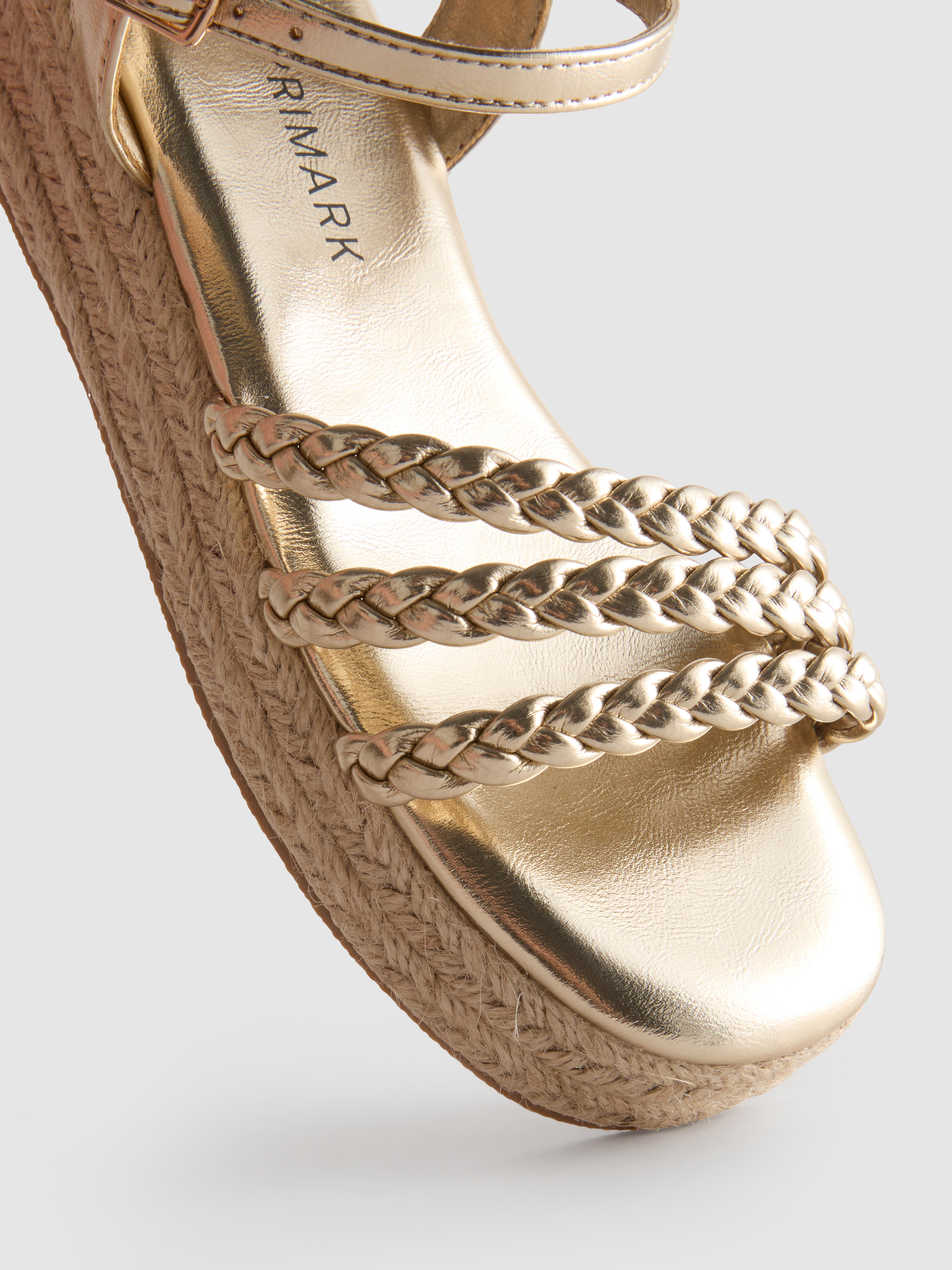 Sandalias tipo alpargata de cuña con tiras trenzadas