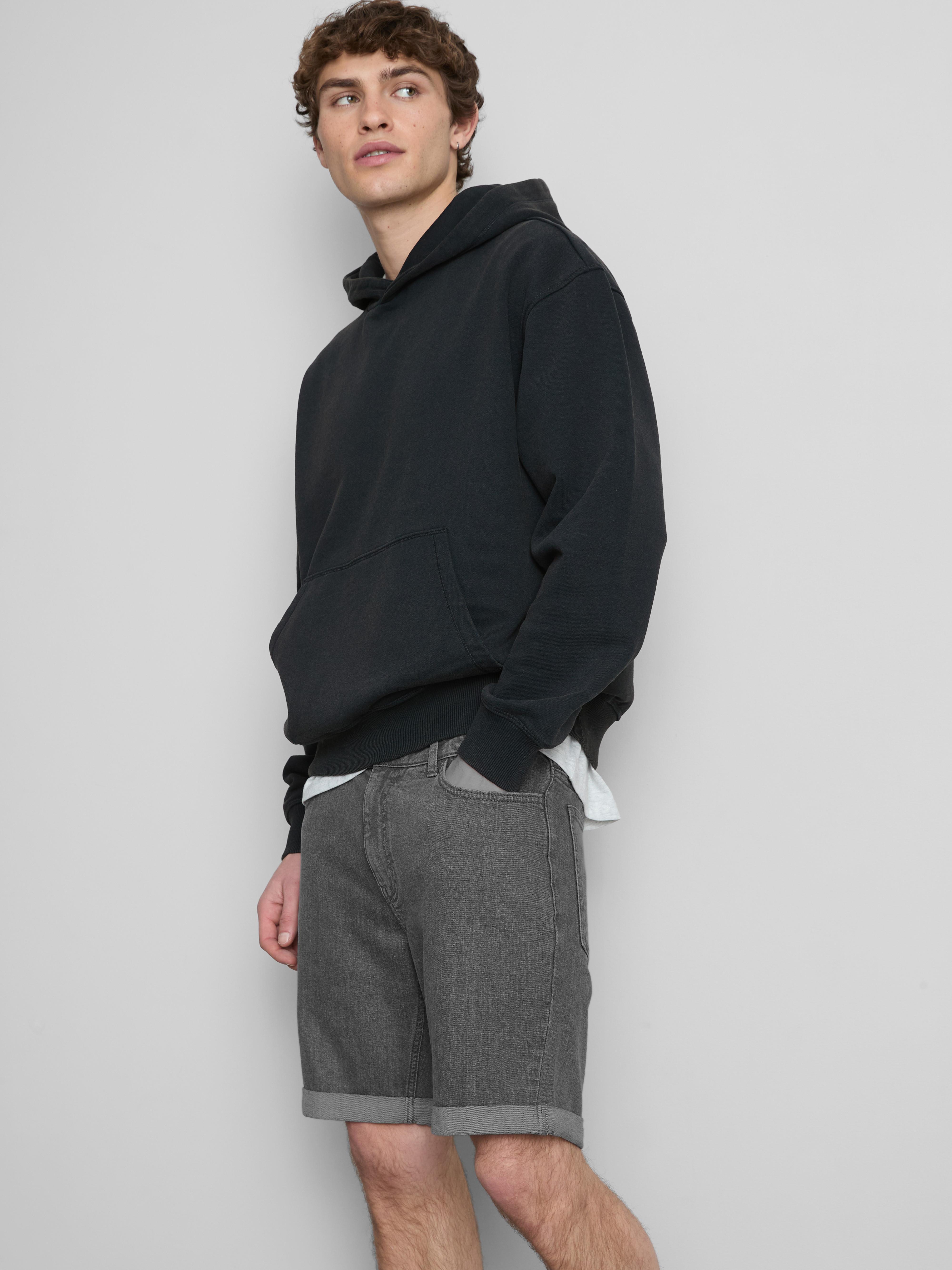 Calções ganga skinny cintura média