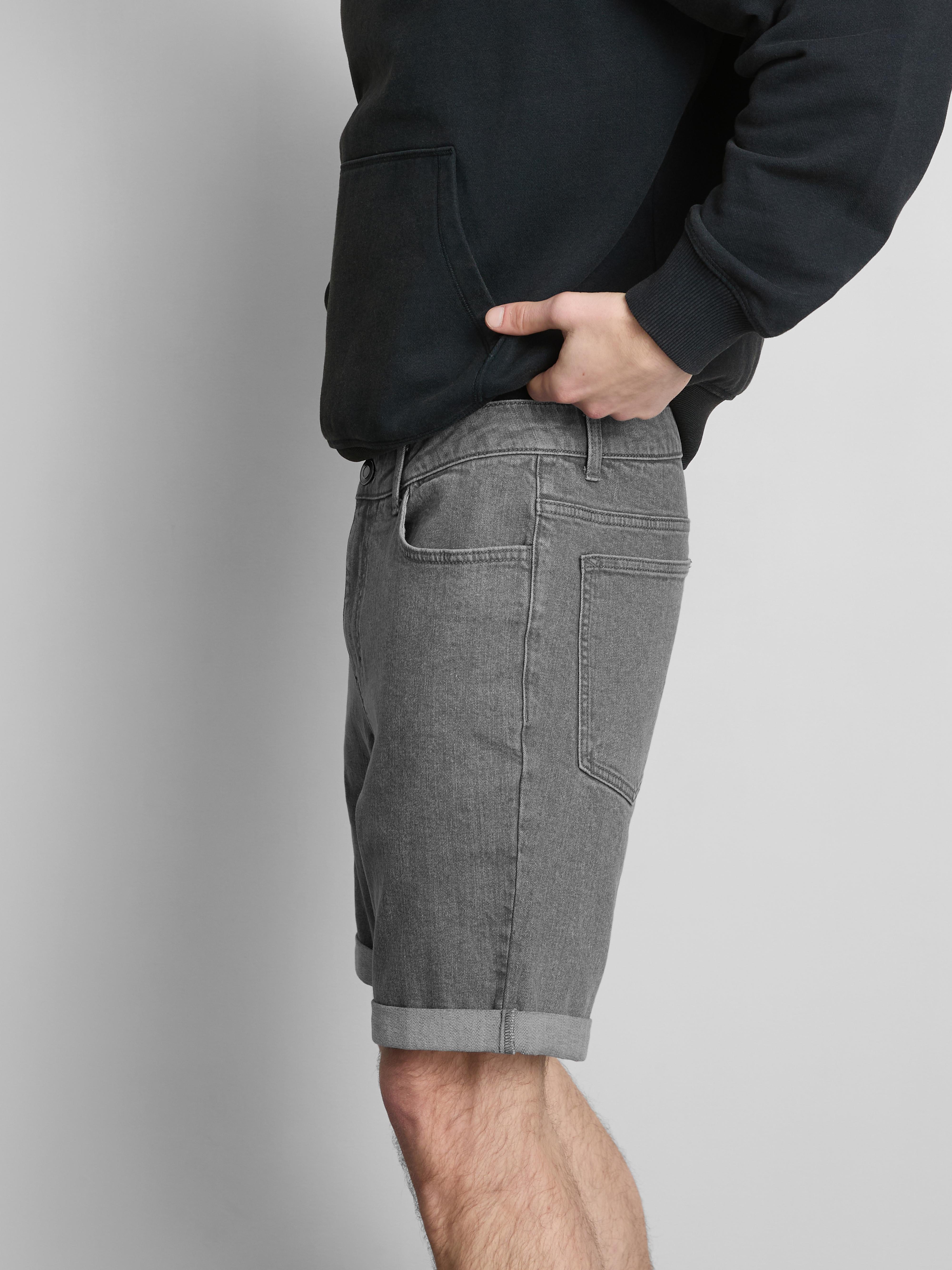 Calções ganga skinny cintura média