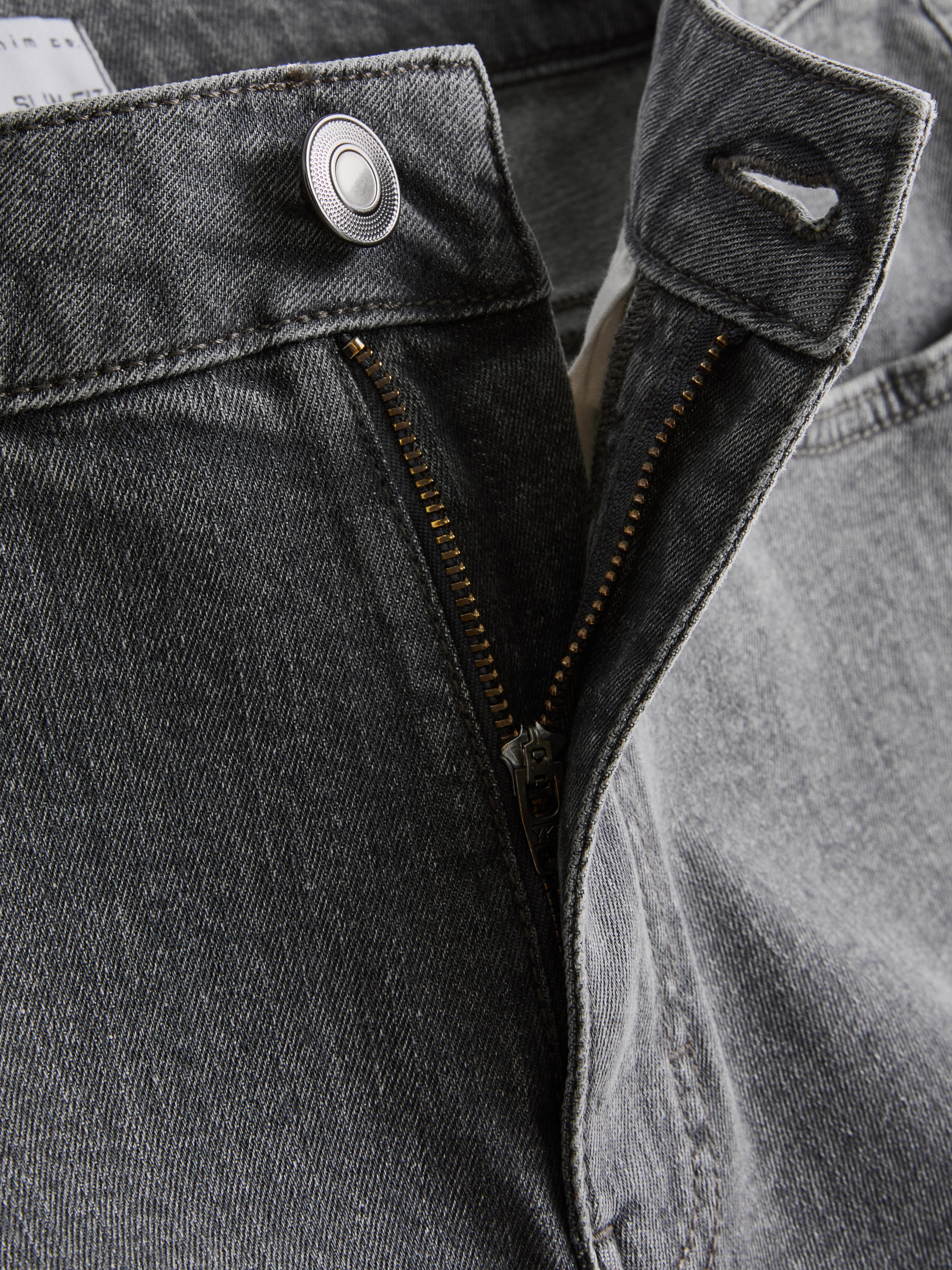 Calções ganga skinny cintura média