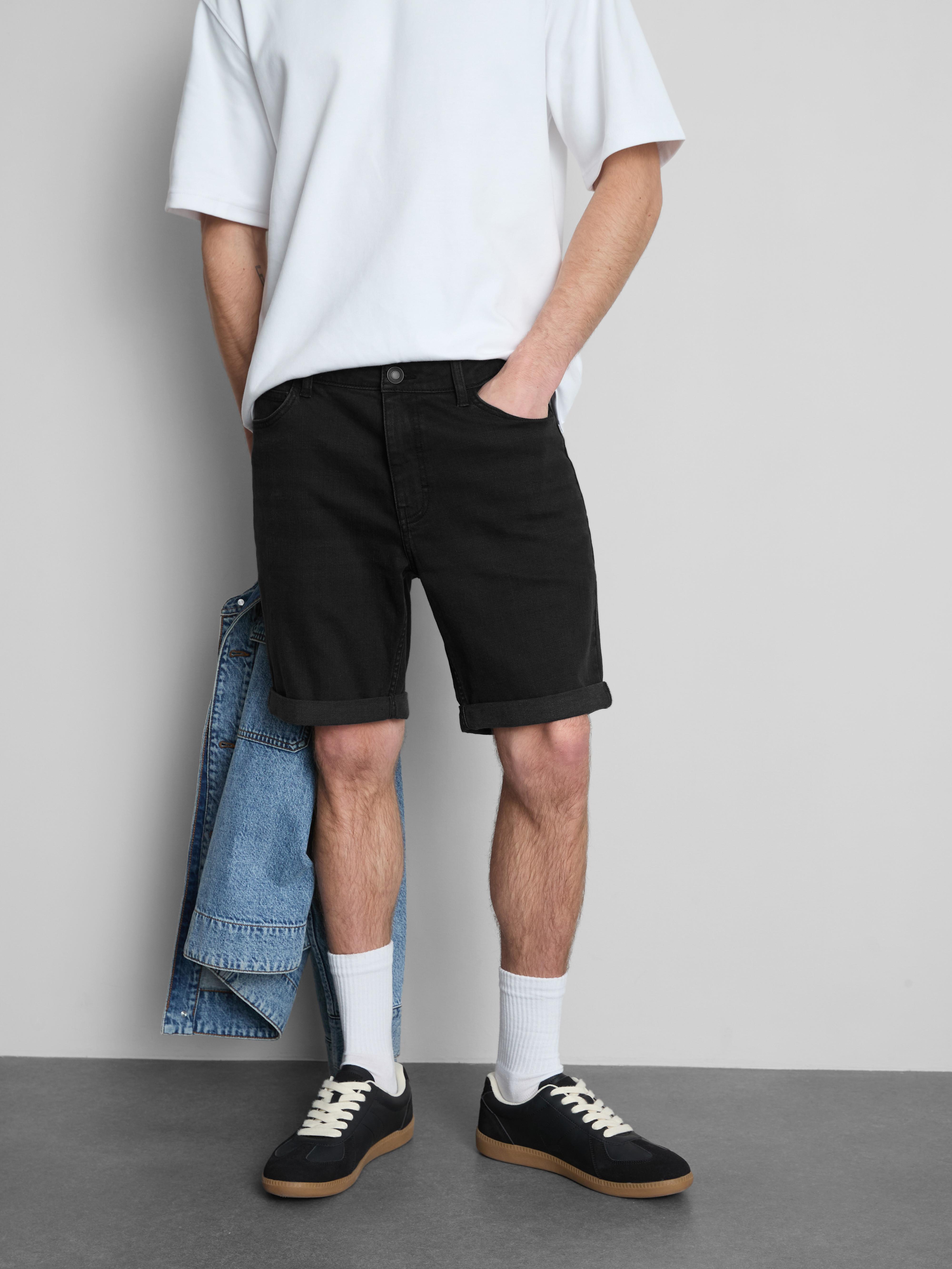 Vaqueros cortos ajustados de talle medio