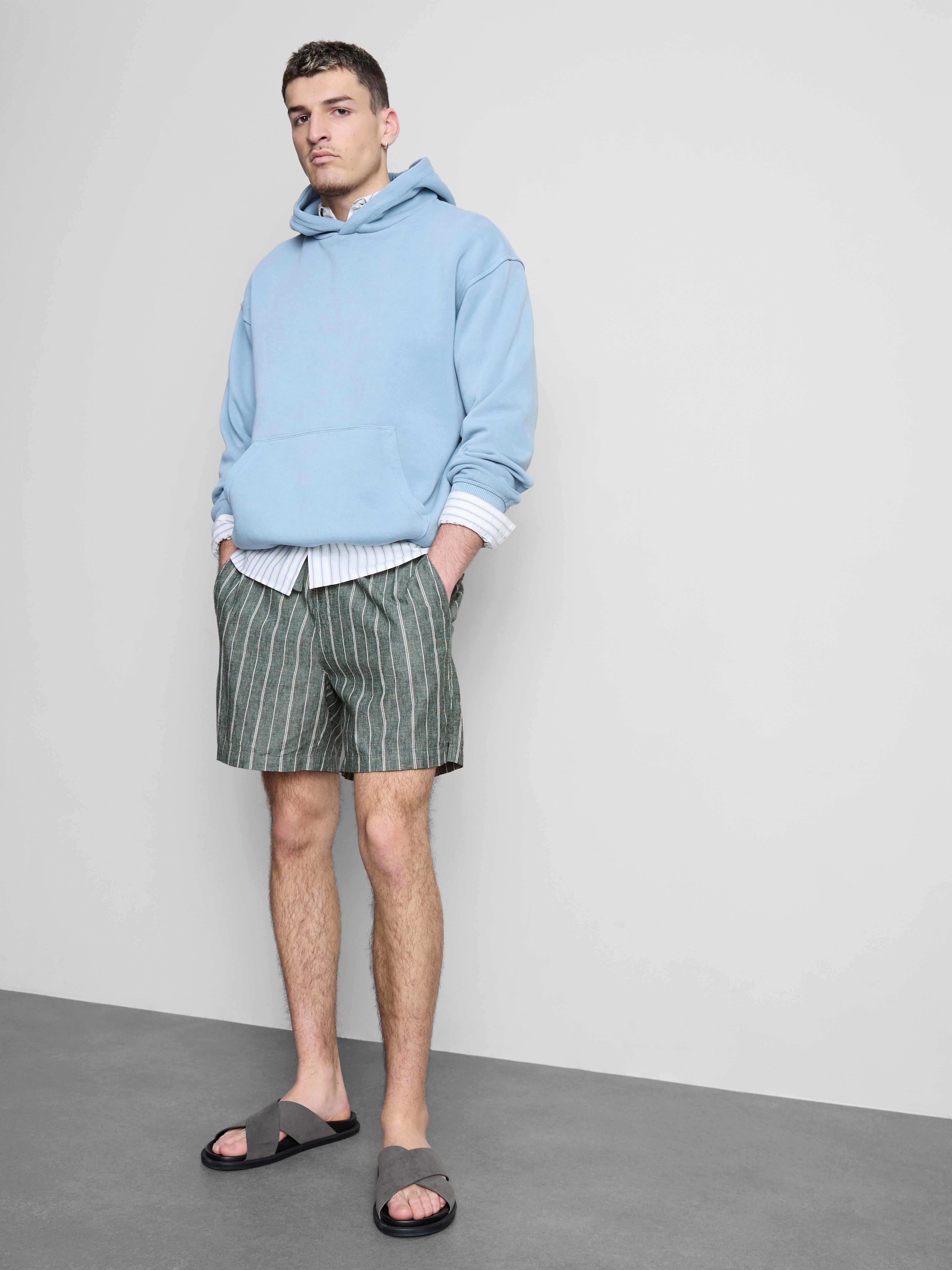 Pantalones cortos a rayas en mezcla de lino