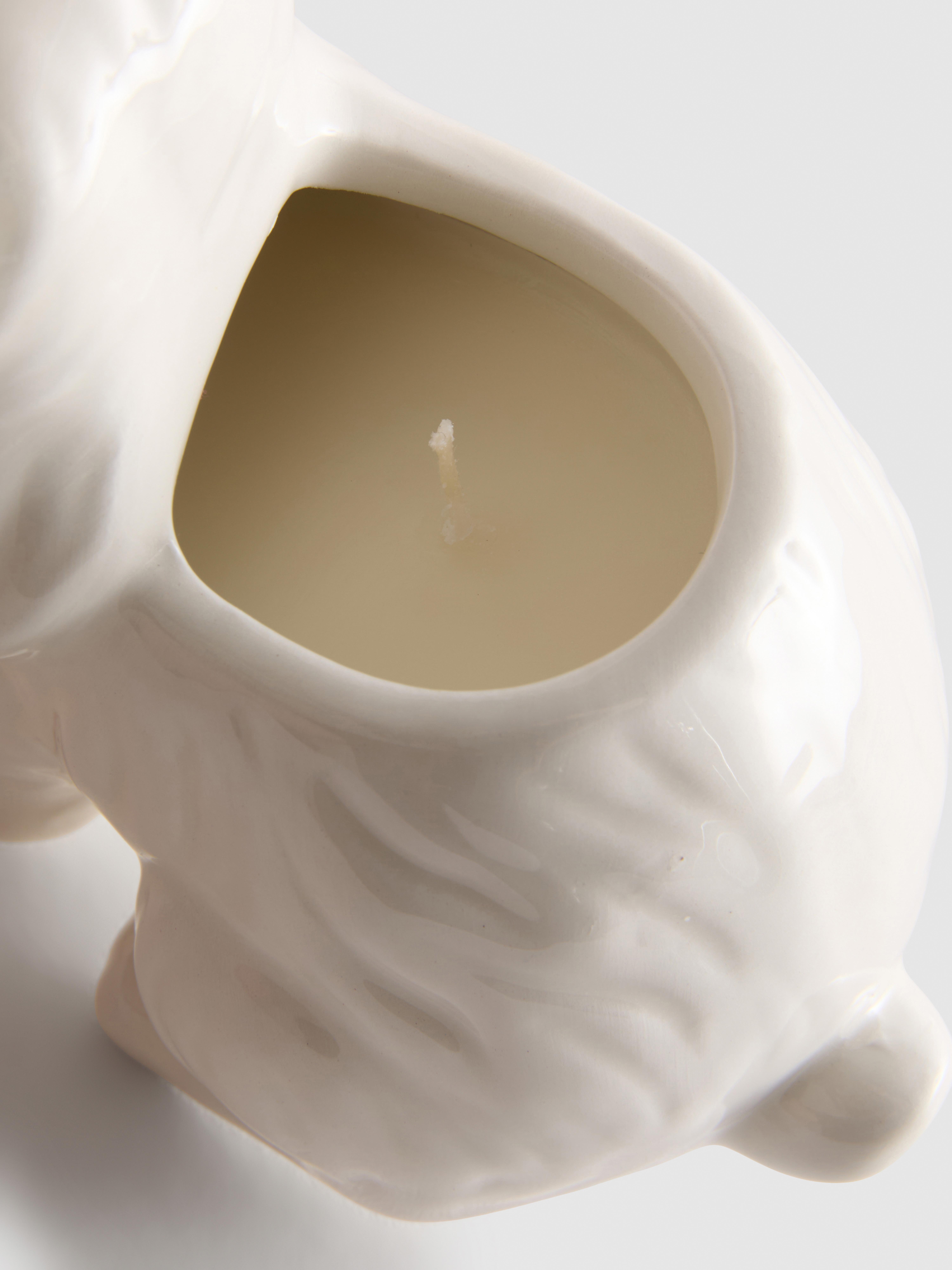 Świeca zapachowa w pojemniku w kształcie pieska