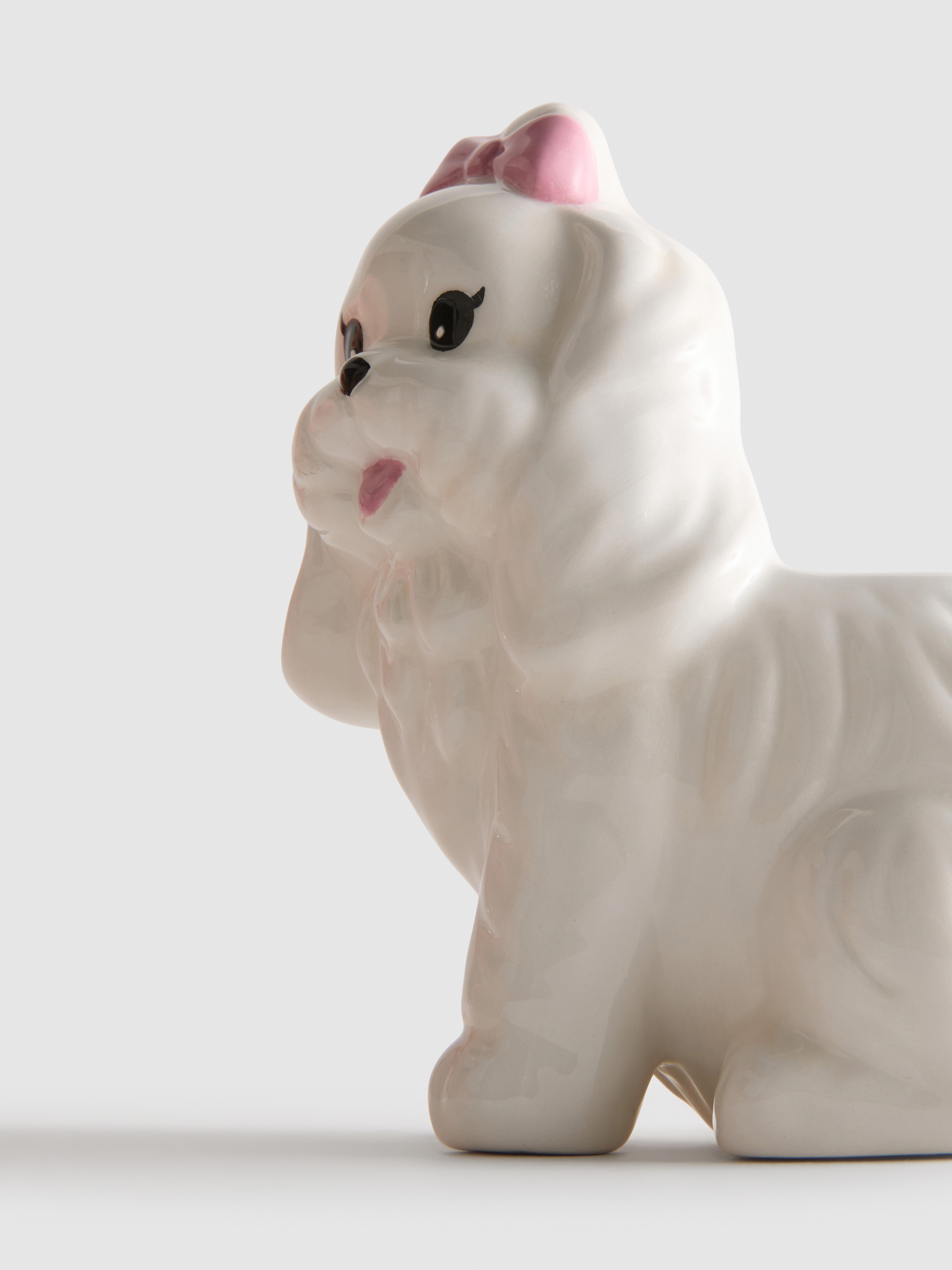 Świeca zapachowa w pojemniku w kształcie pieska