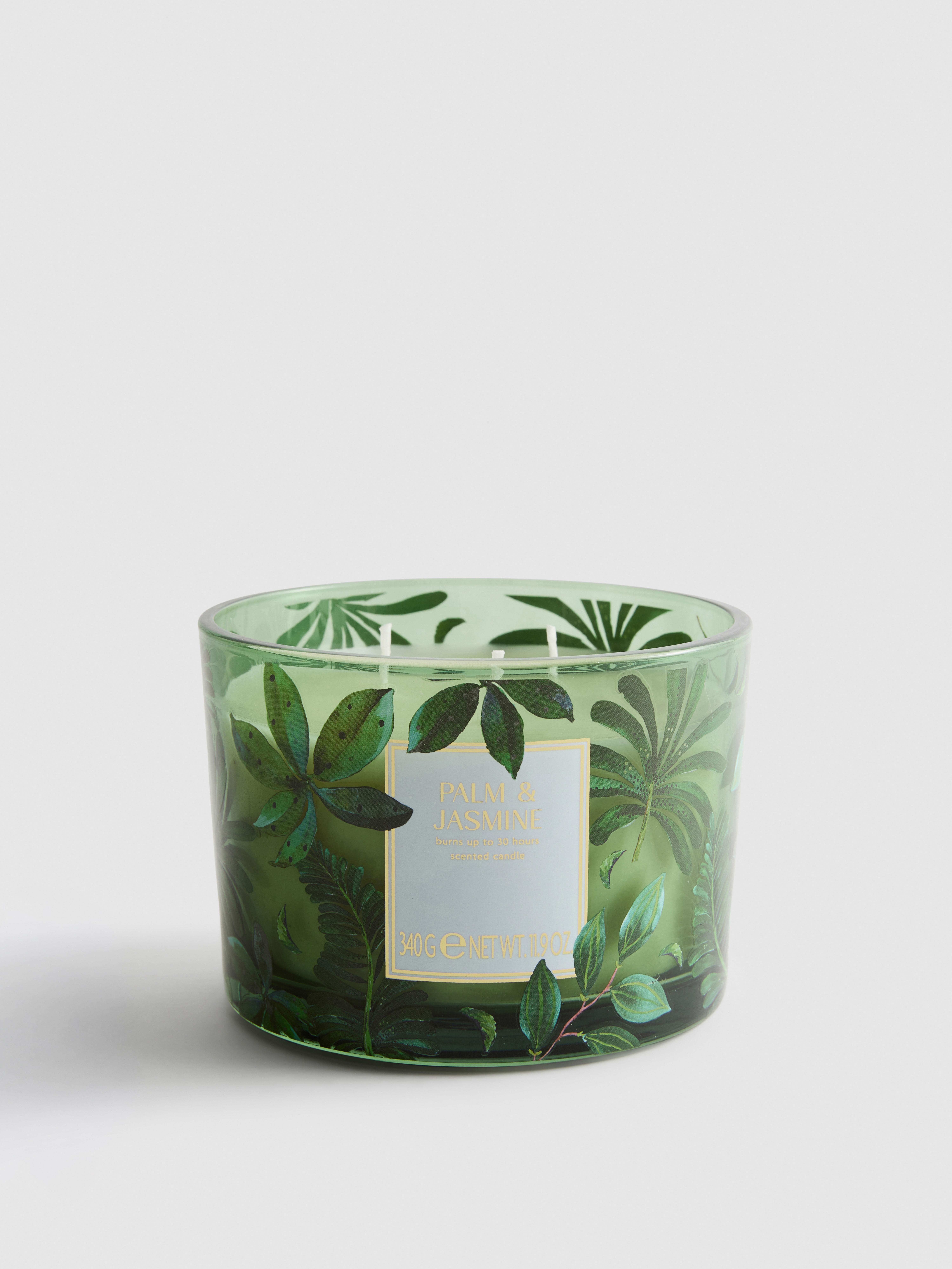 Candela profumata in vasetto di vetro decorativo