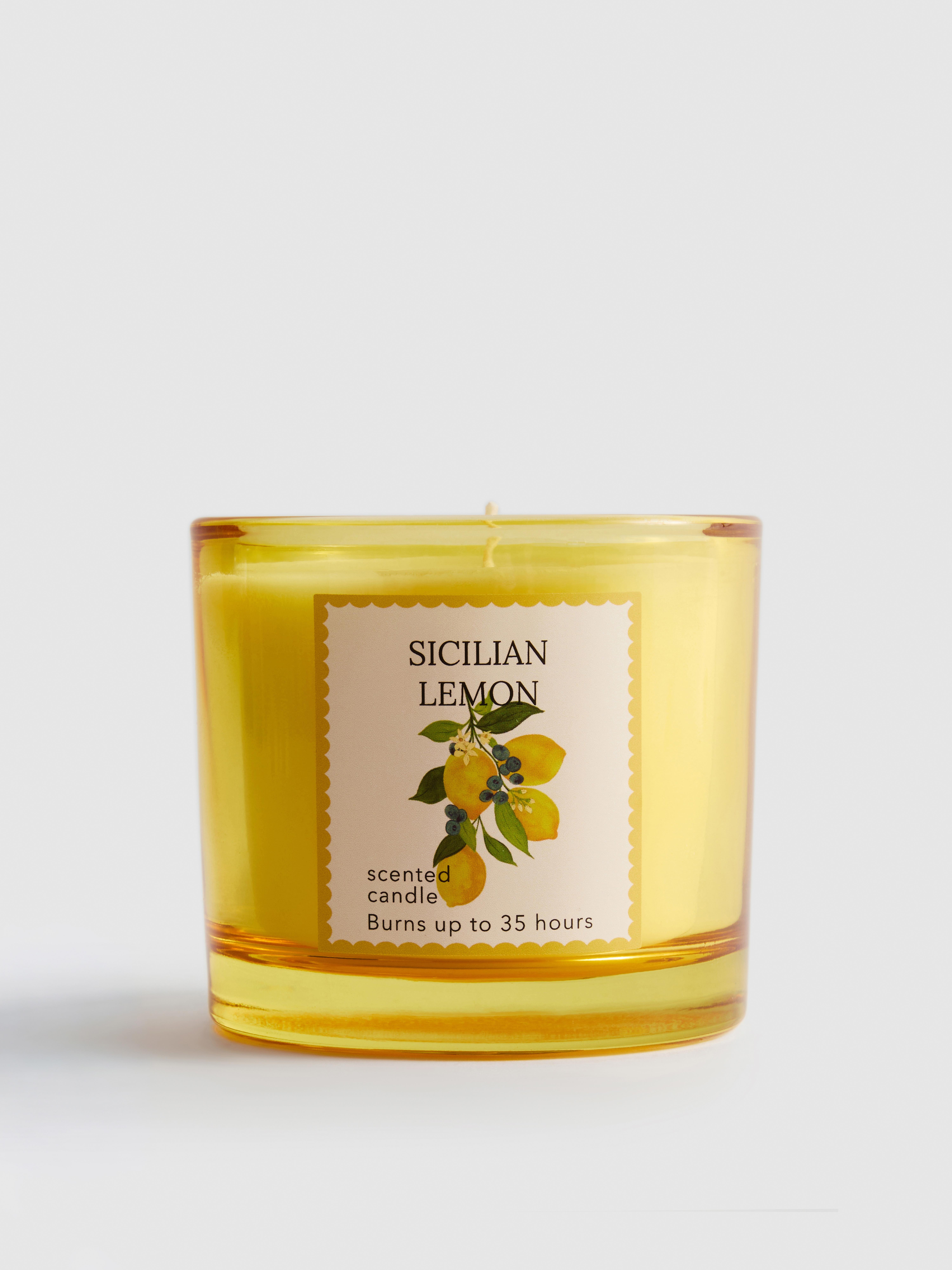 Vela aromática frutal en tarro de vidrio