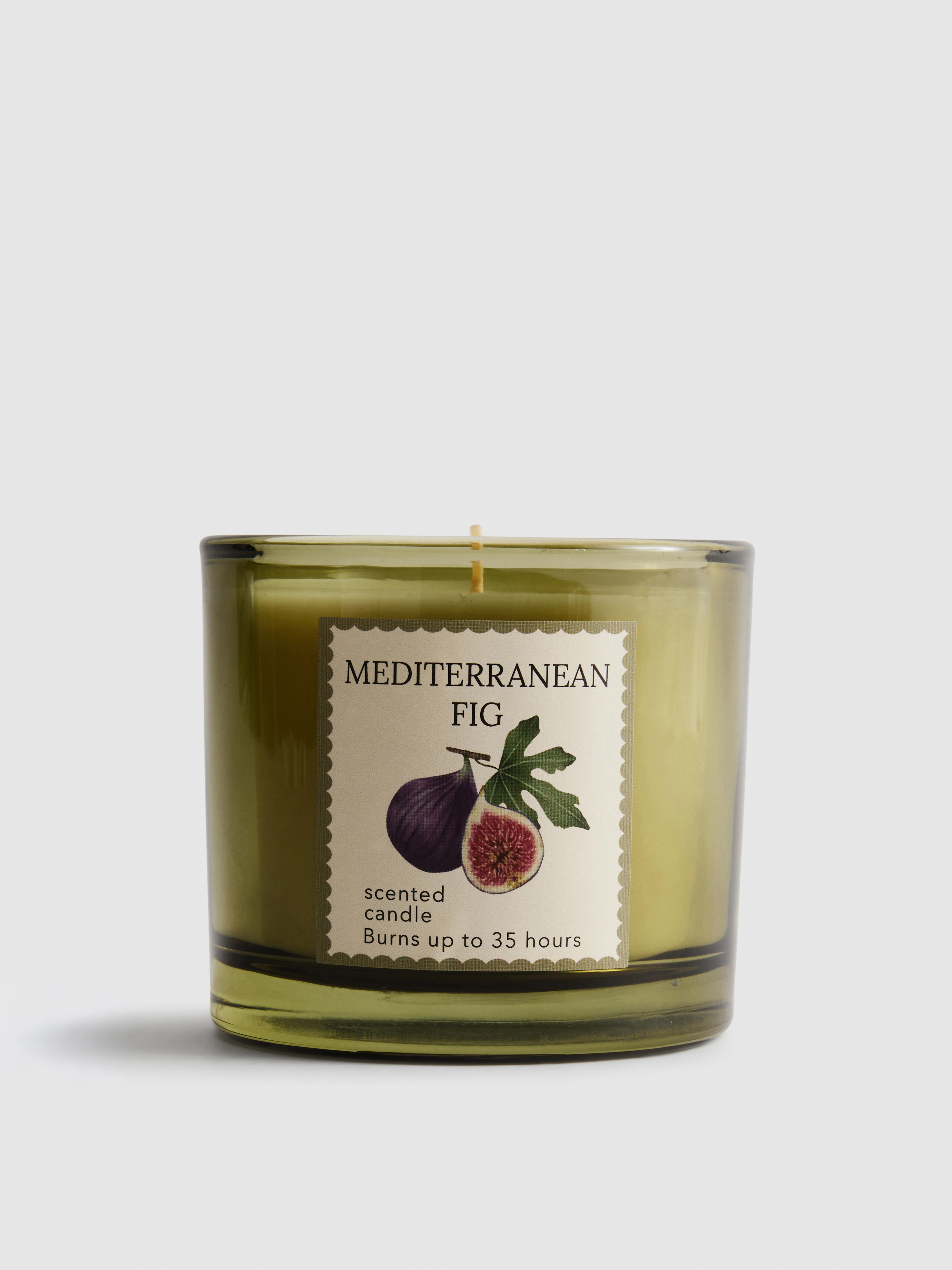 Vela aromática frutal en tarro de vidrio