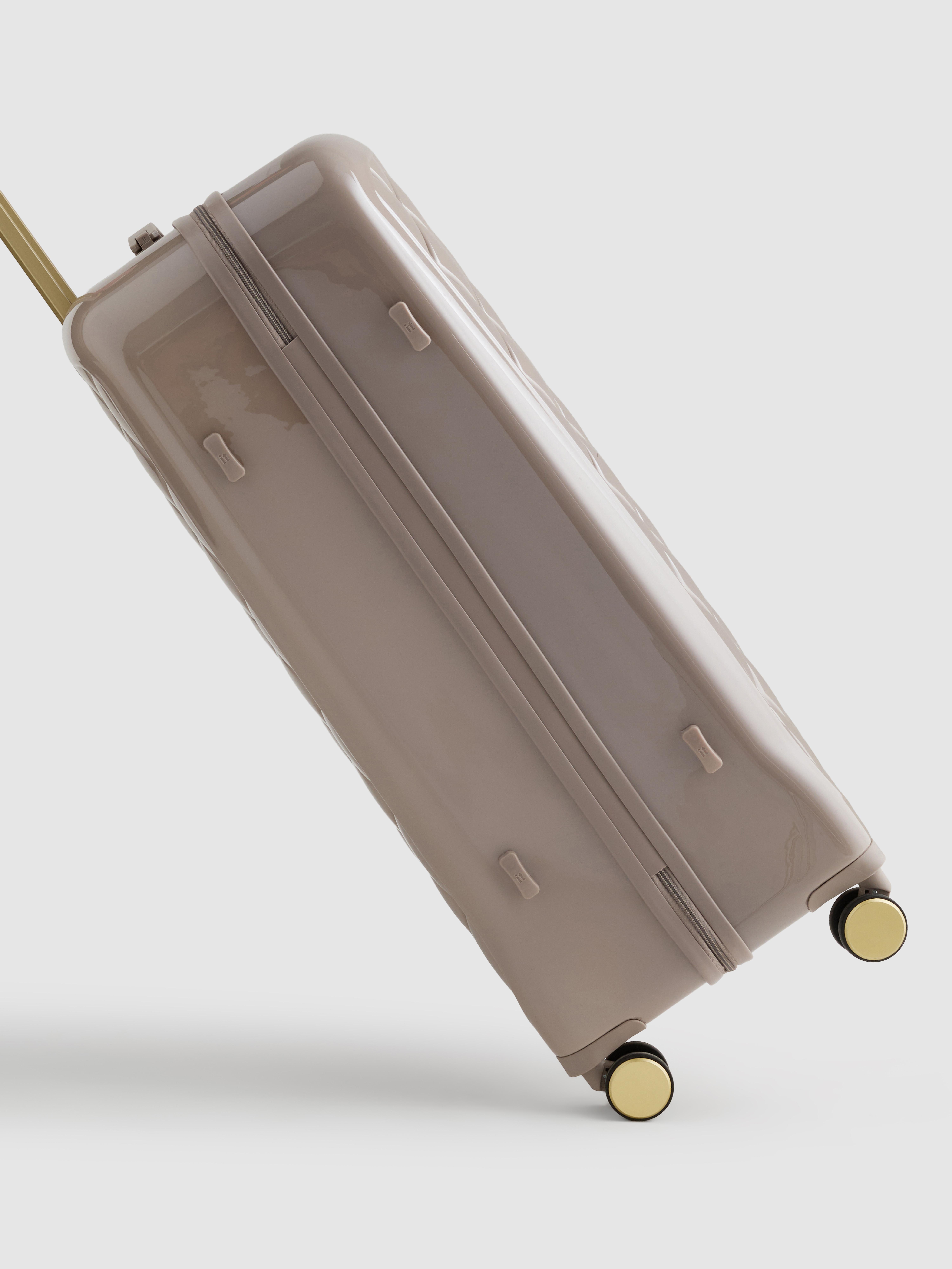 Mala rígida acolchoada