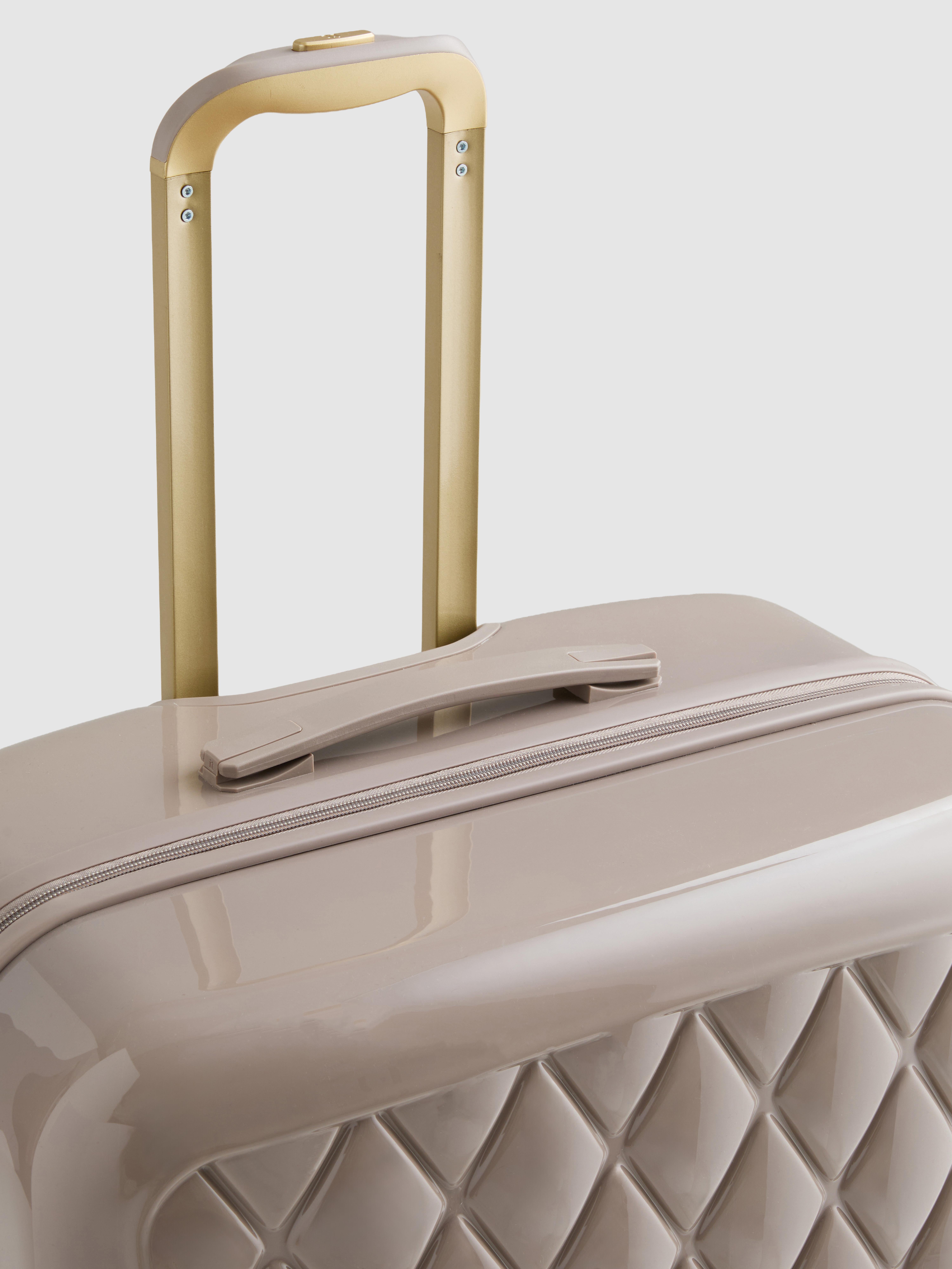 Mala rígida acolchoada