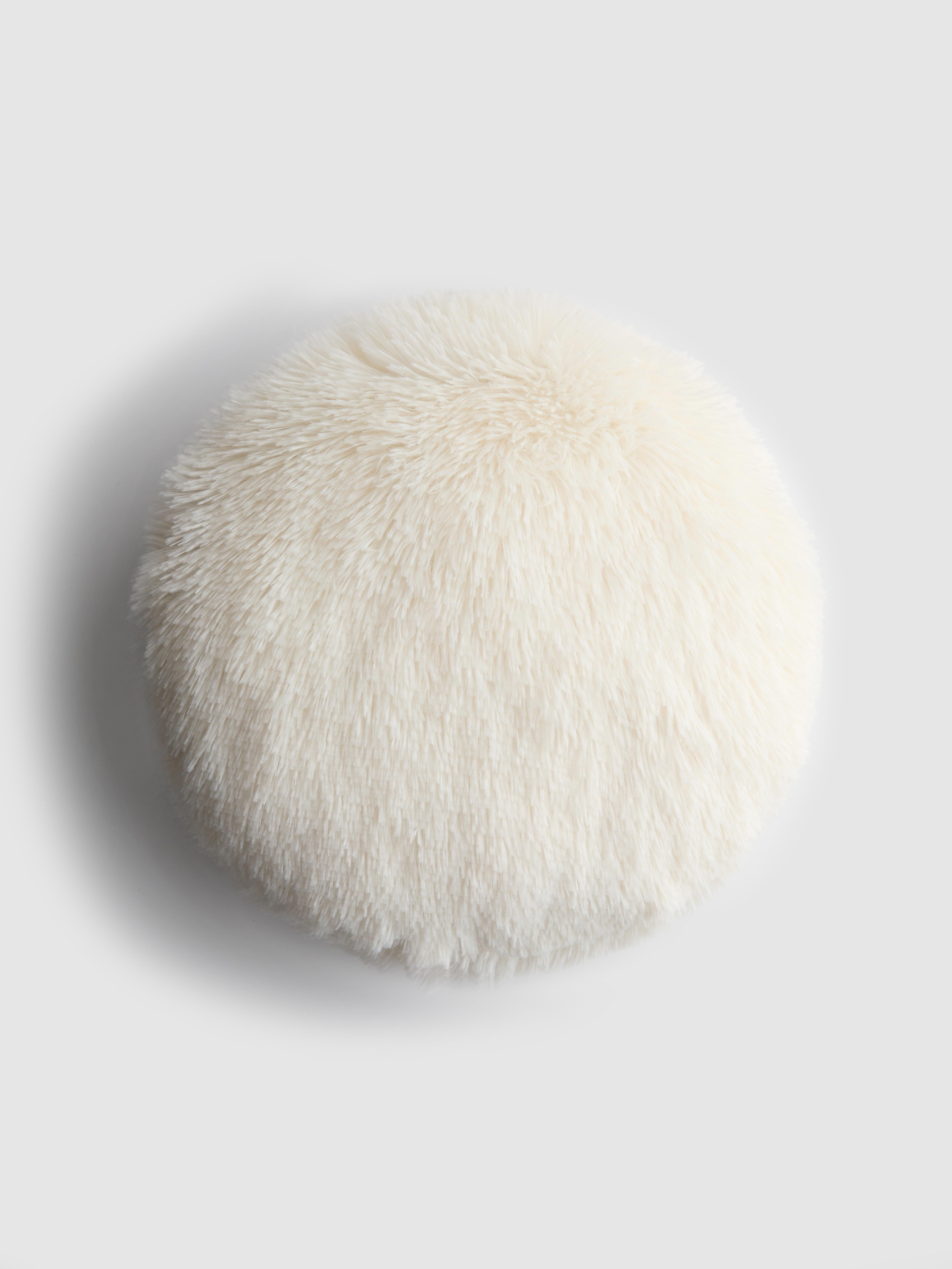 Coussin rond duveteux