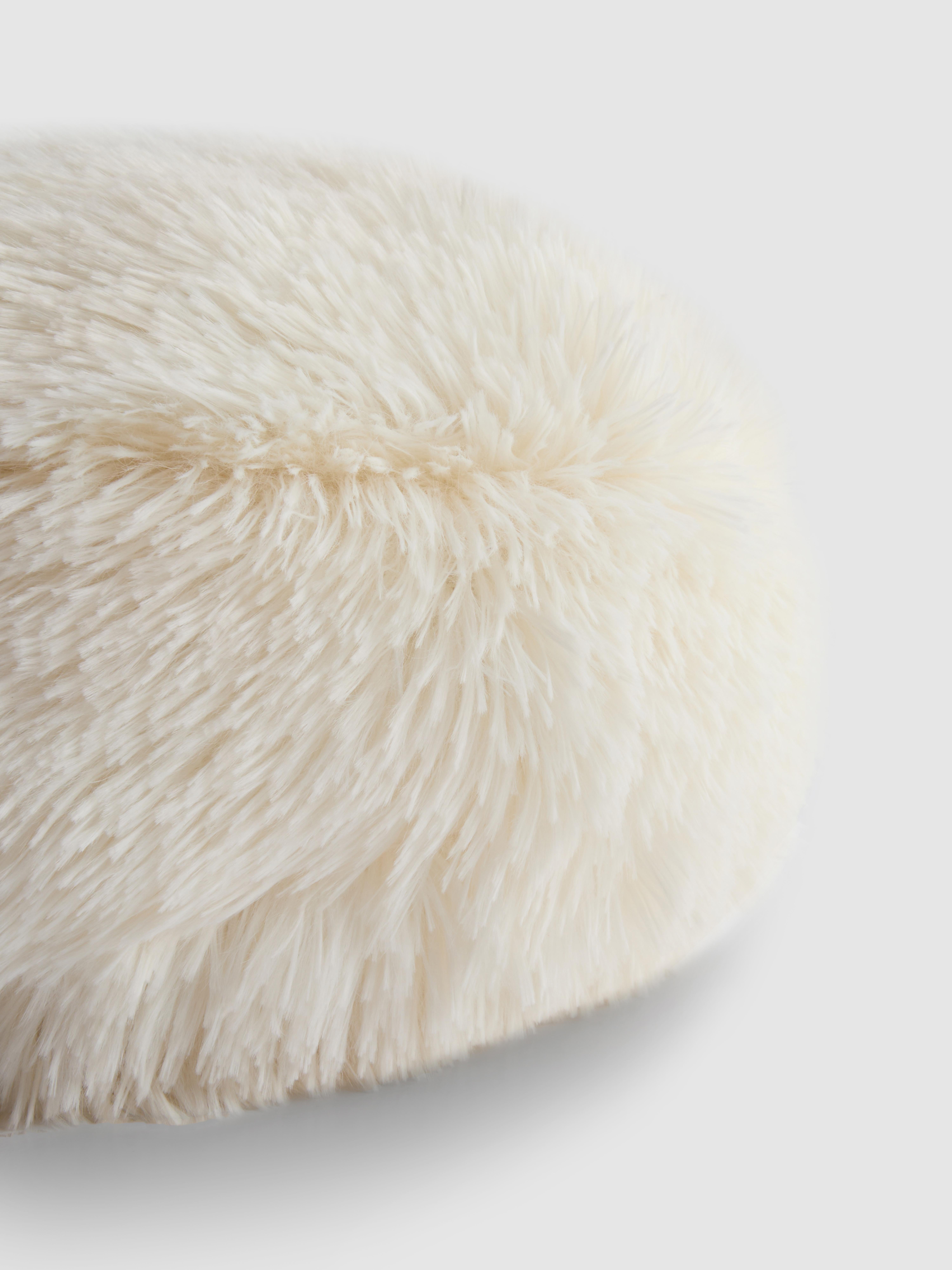 Coussin rond duveteux