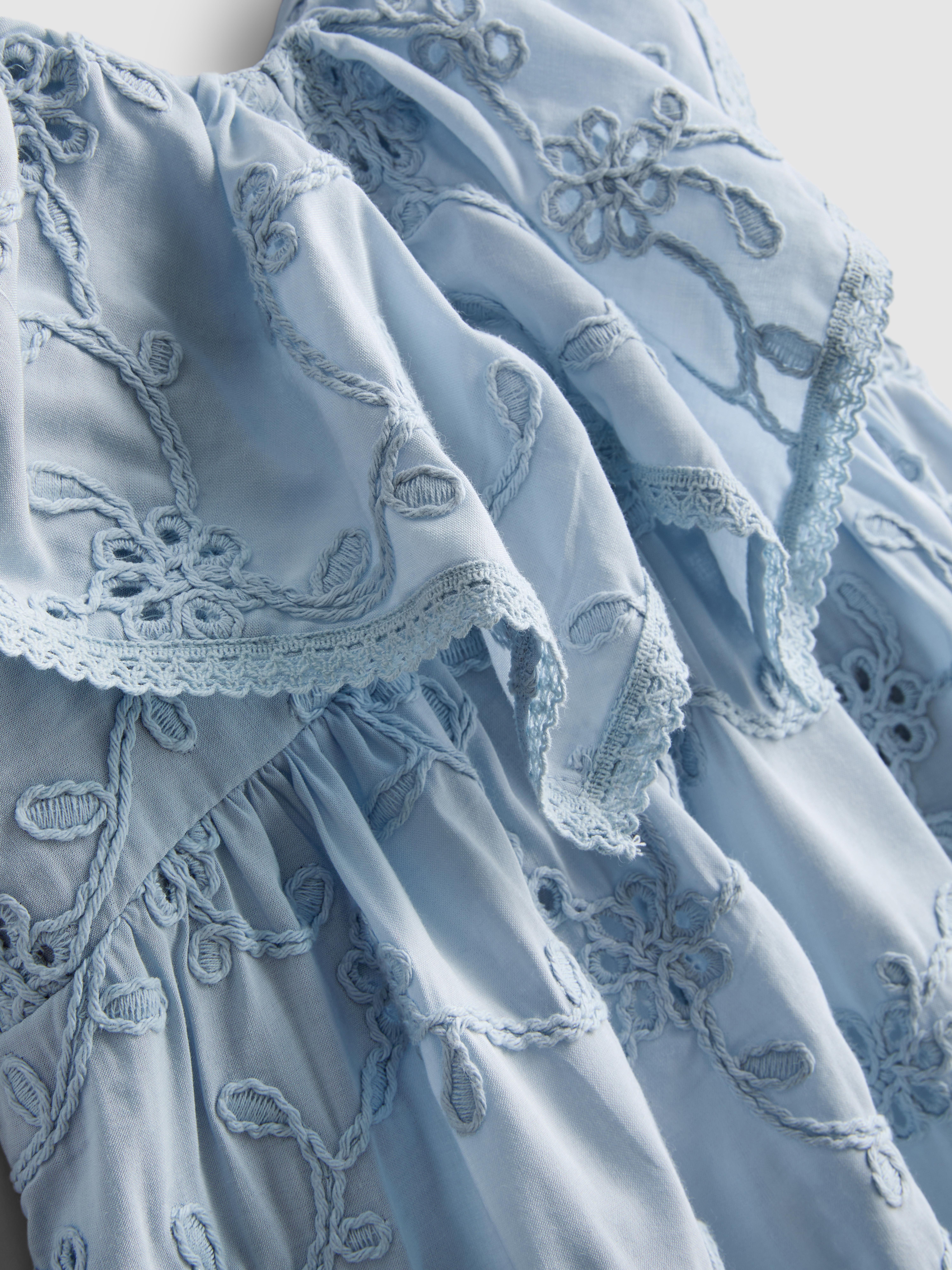 1,5-12 jr | Smokjurk met geborduurde bloemen The Edit