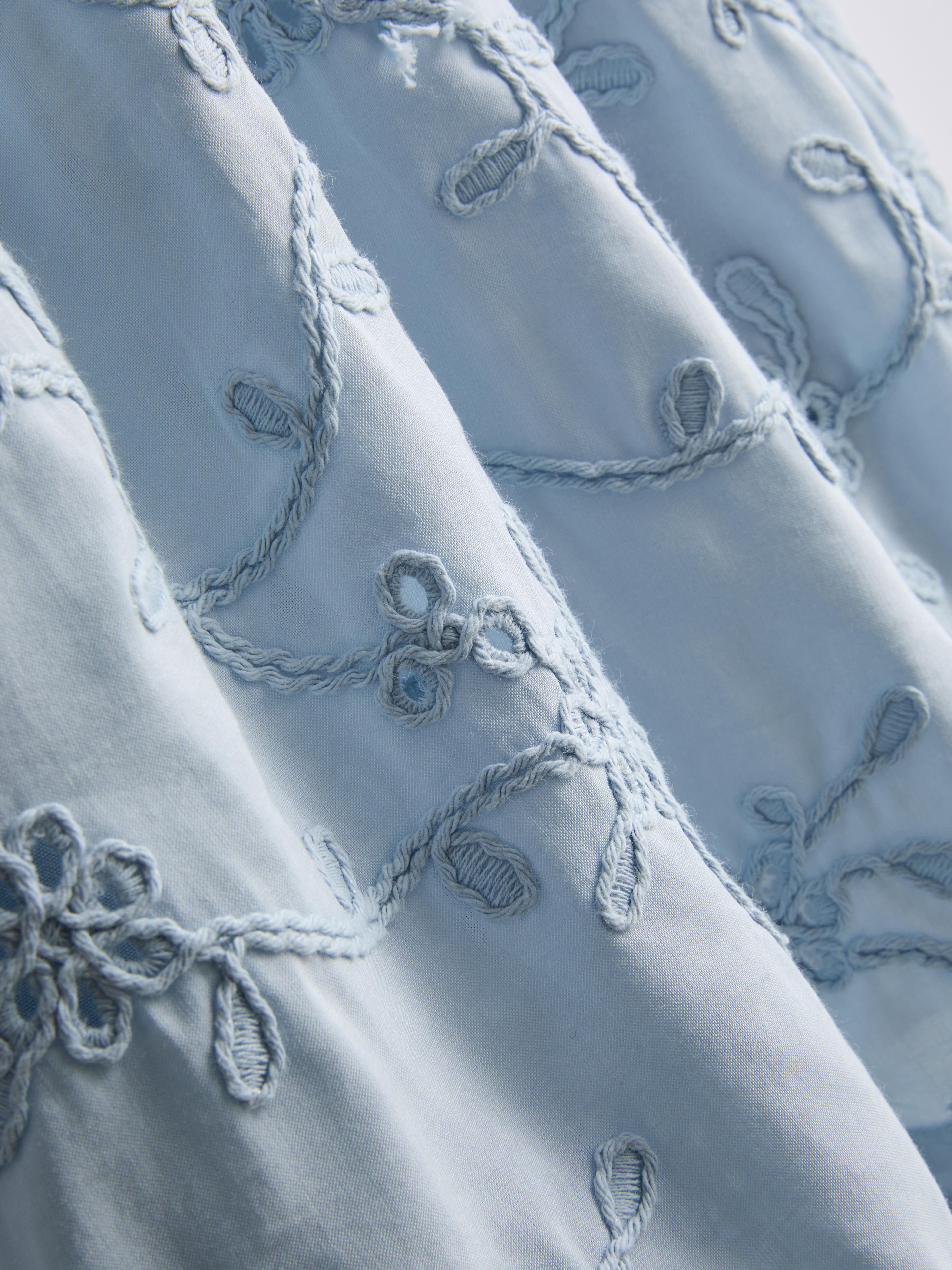 1,5-12 jr | Smokjurk met geborduurde bloemen The Edit