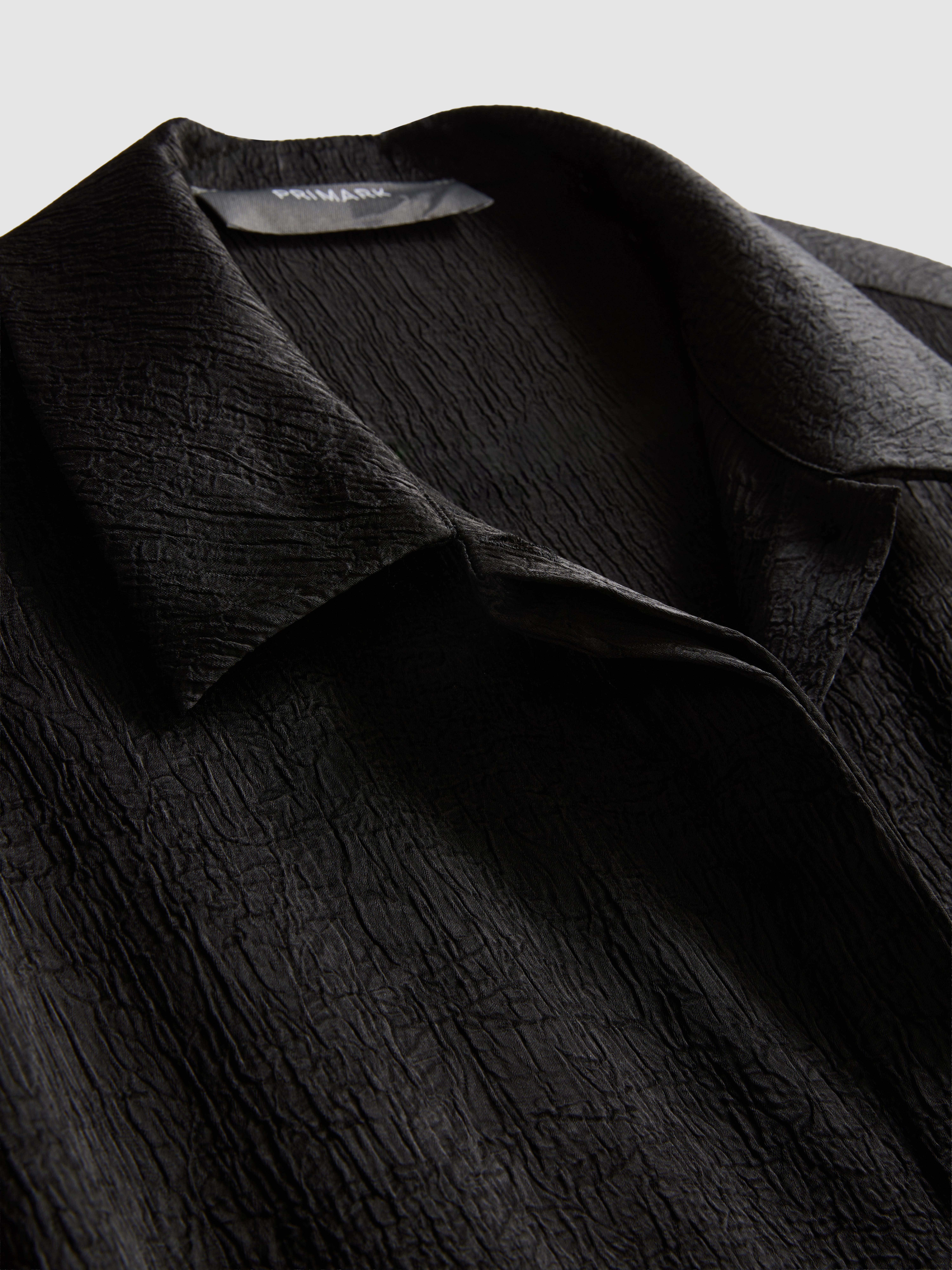 Chemise décontractée en satin texturé