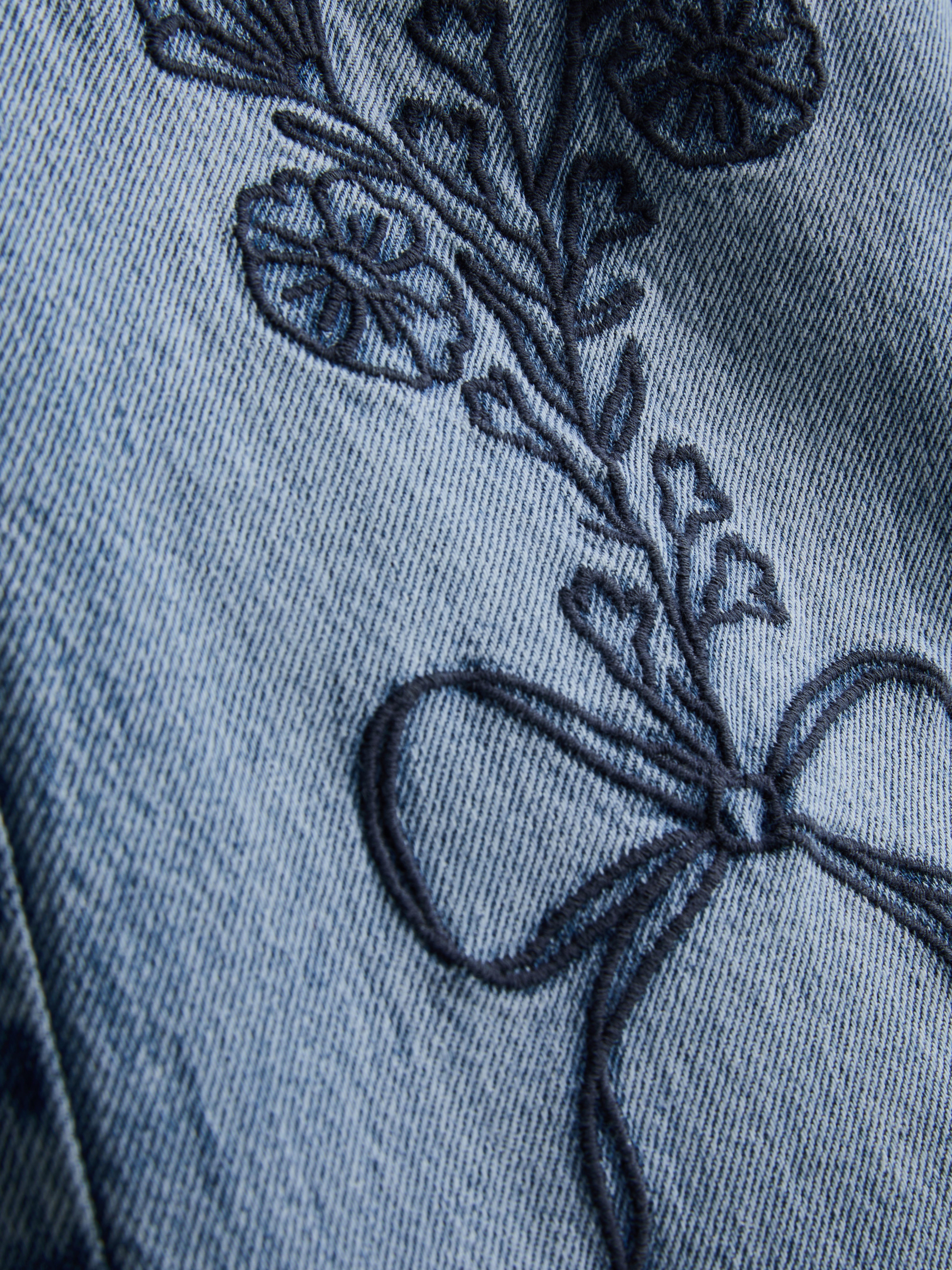 7-15 jr | Jeans met wijde pijpen en borduursel
