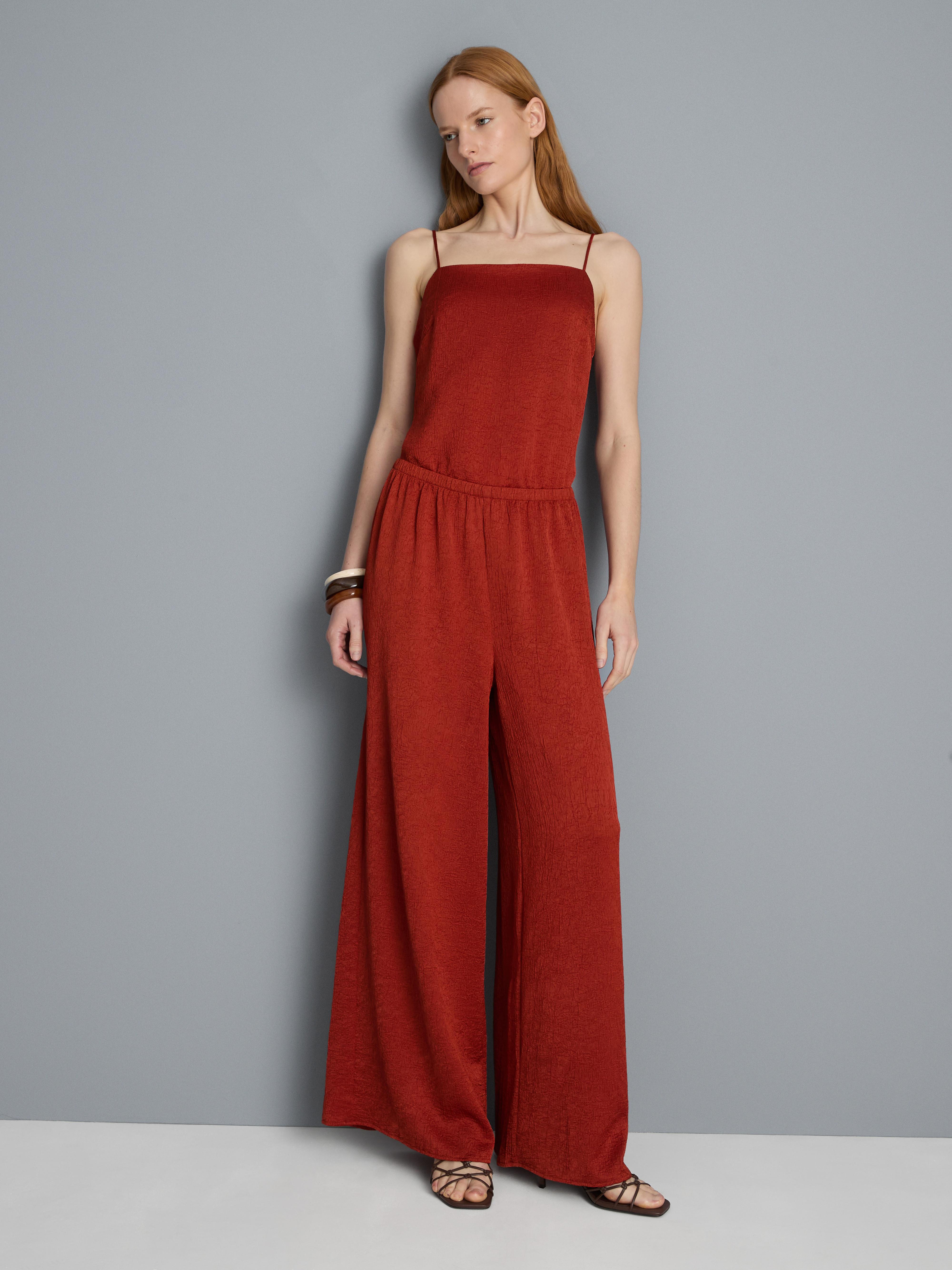 Calças cetim texturadas corte direito