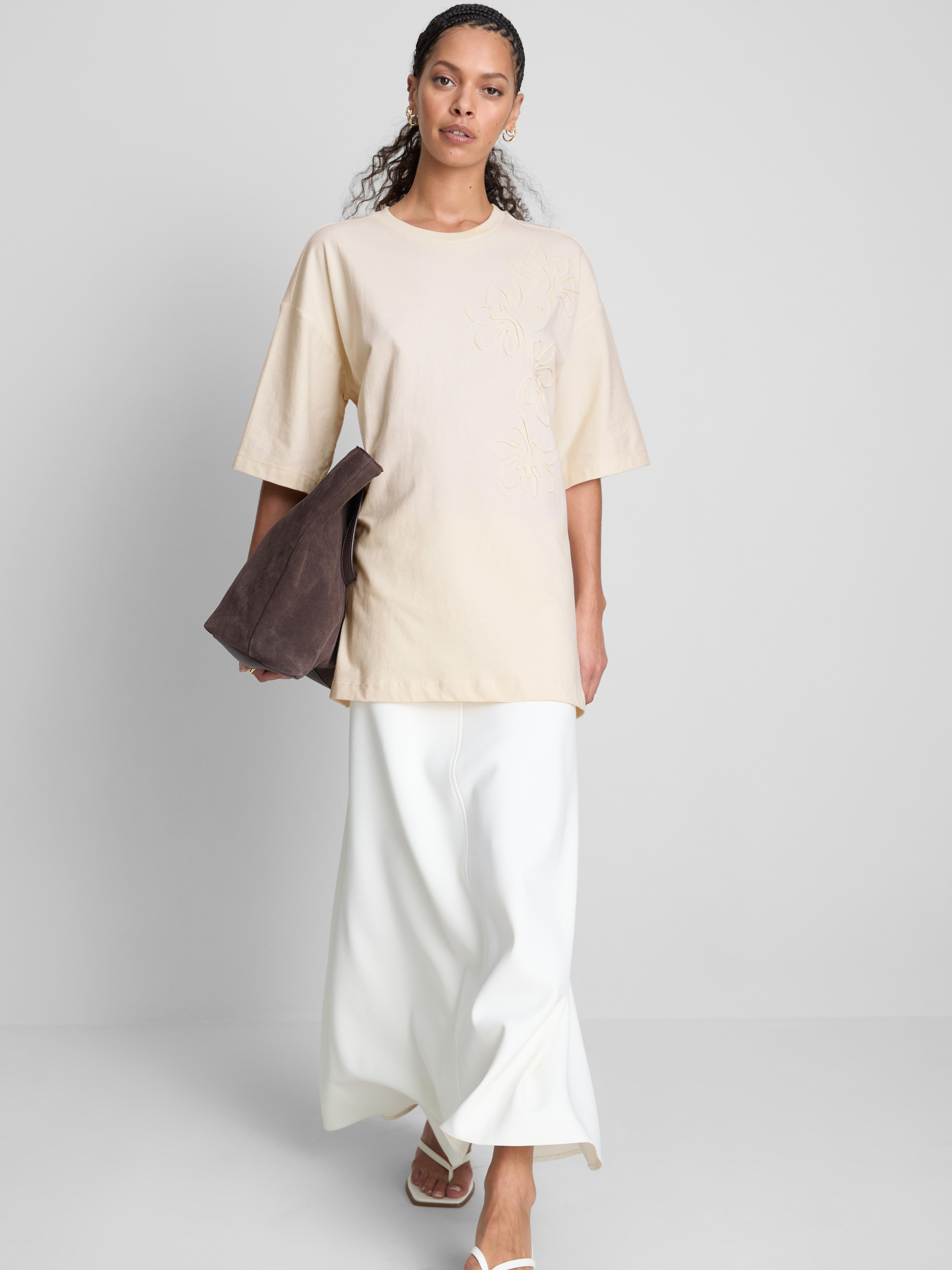 Katoenen T-shirt met lage mouwinzet en borduursel