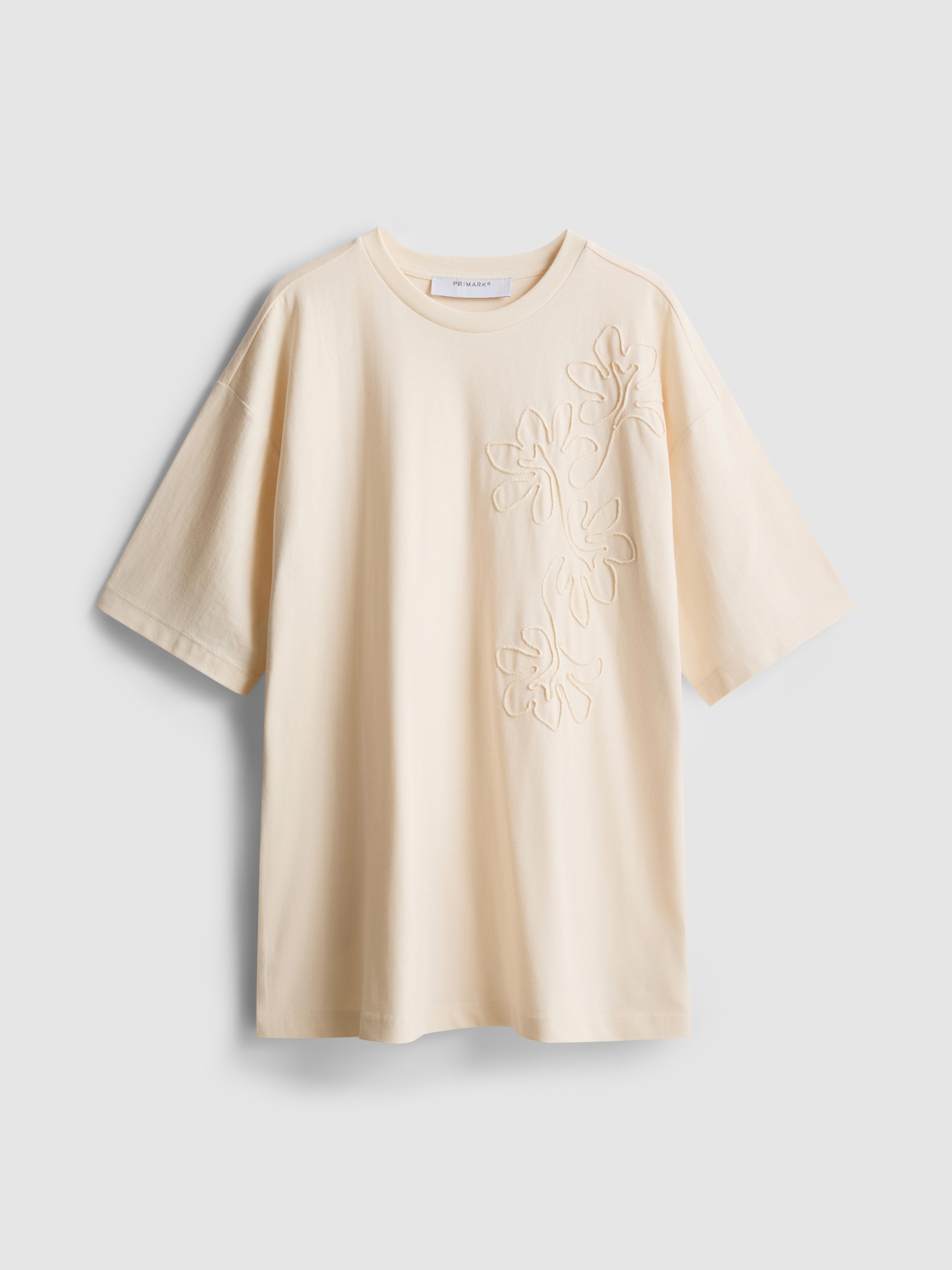 Bawełniany T-shirt z haftem i obniżoną linią ramion